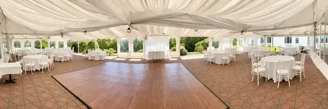 There is a dance floor in the middle of the room.
