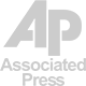 Associated Press logo: "AP" in gray letters above "Associated Press" in gray.