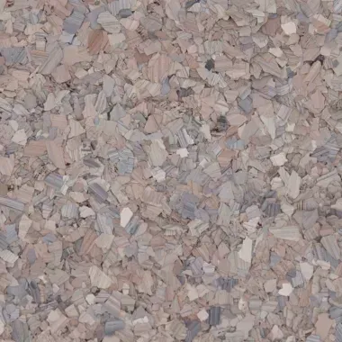 Close-up of a speckled surface; various shades of brown, gray, and beige flecks.