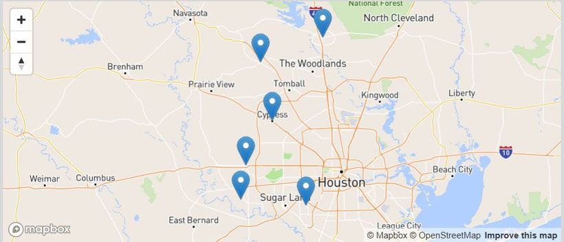 Map of the Houston area with several blue location pins marking multiple points.
