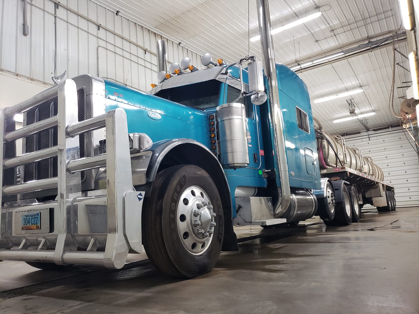 Blue truck on a warehouse