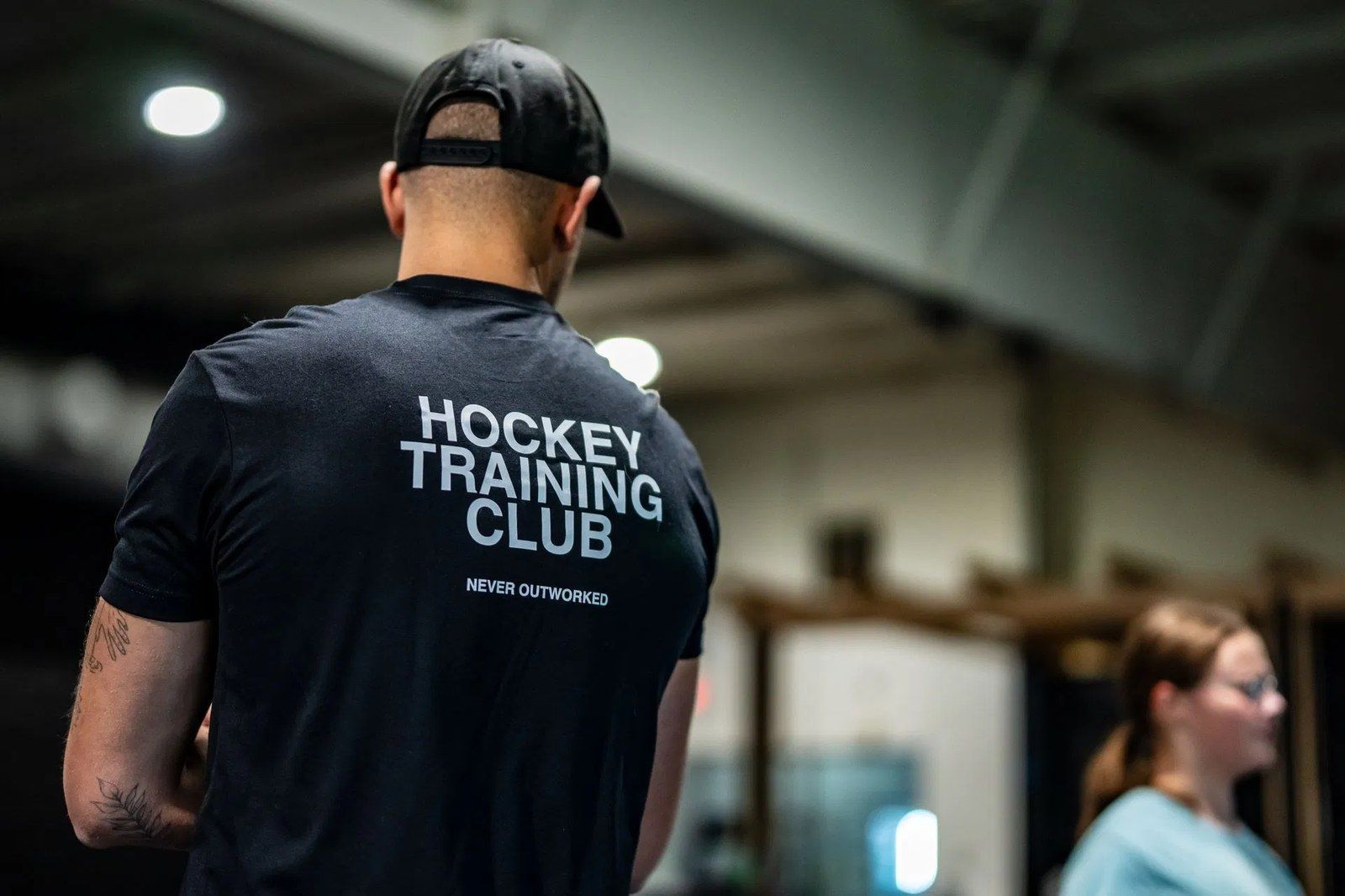 Ghost Athletica coach working with athletes in a focused training environment