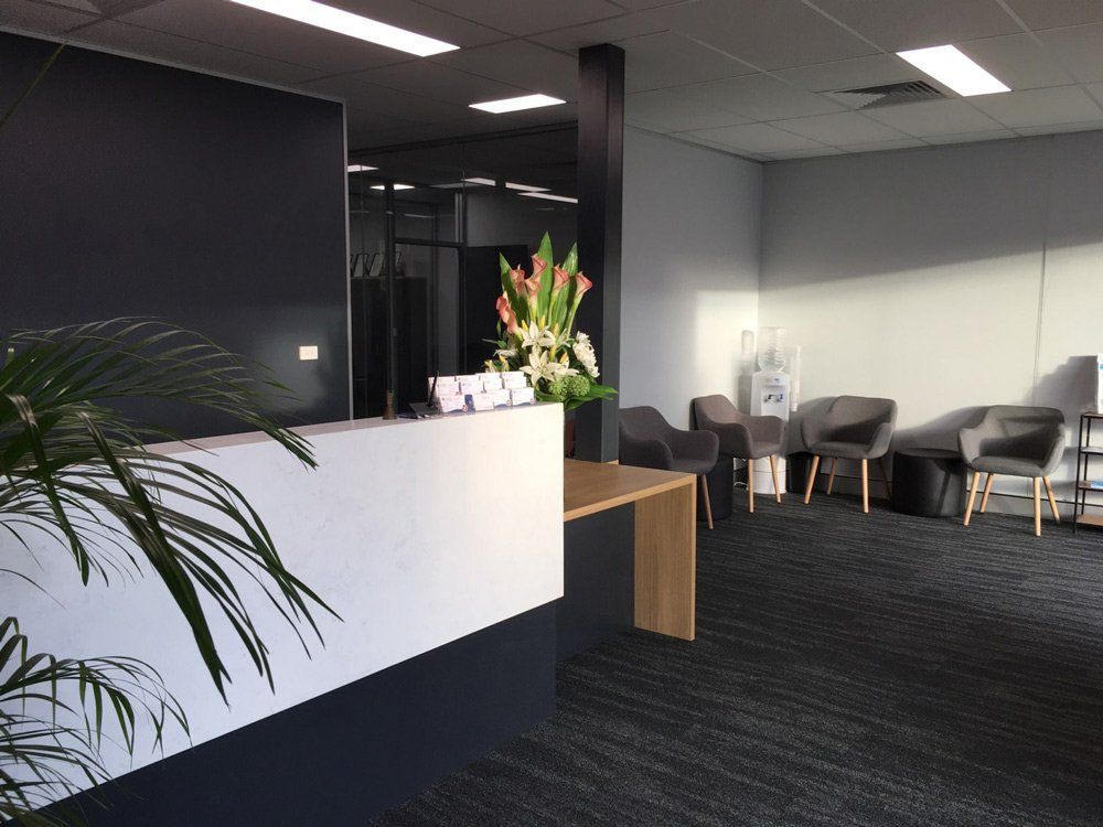 Reception Area With White and Gray Walls — Acheson Building Certification in Nambucca Heads, NSW
