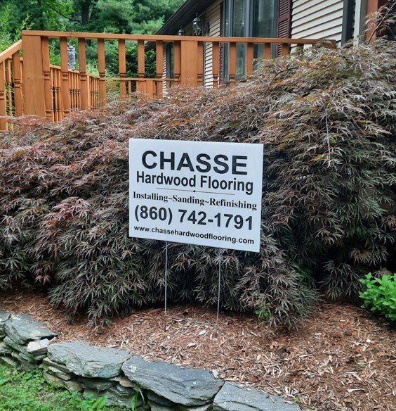 Chasse Hardwood Flooring Sign On The Sidewalk — Coventry, CT — Chasse Hardwood Flooring
