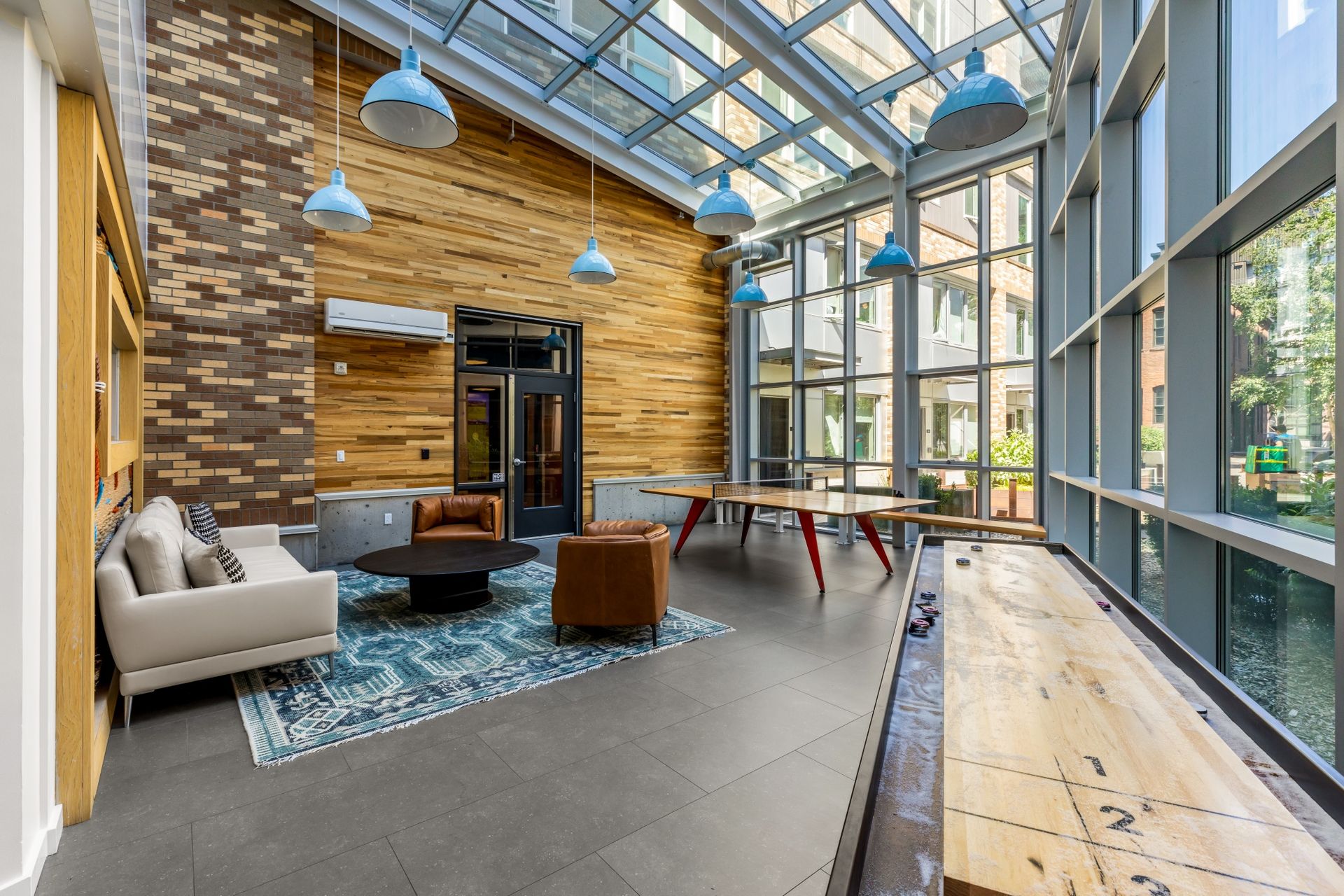 There is a shuffleboard in the middle of the room at Stack House.
