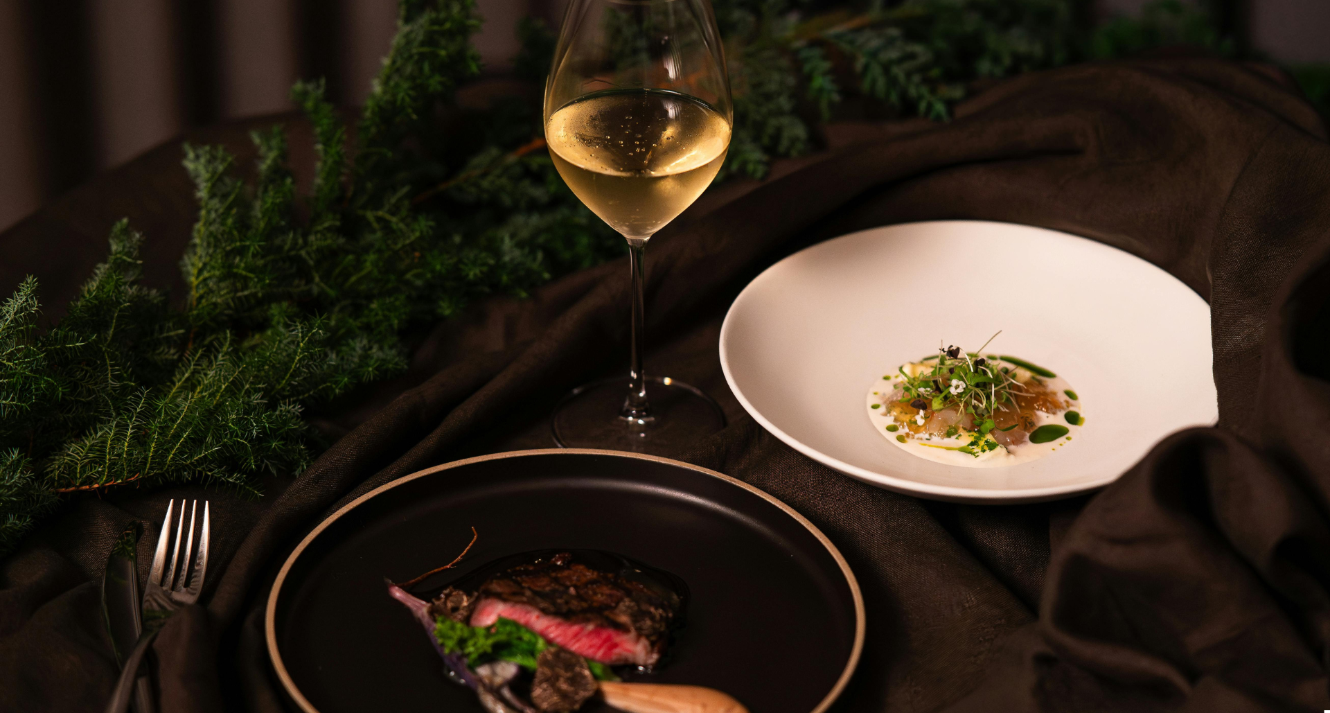 Glass of wine and a fine dining dish
