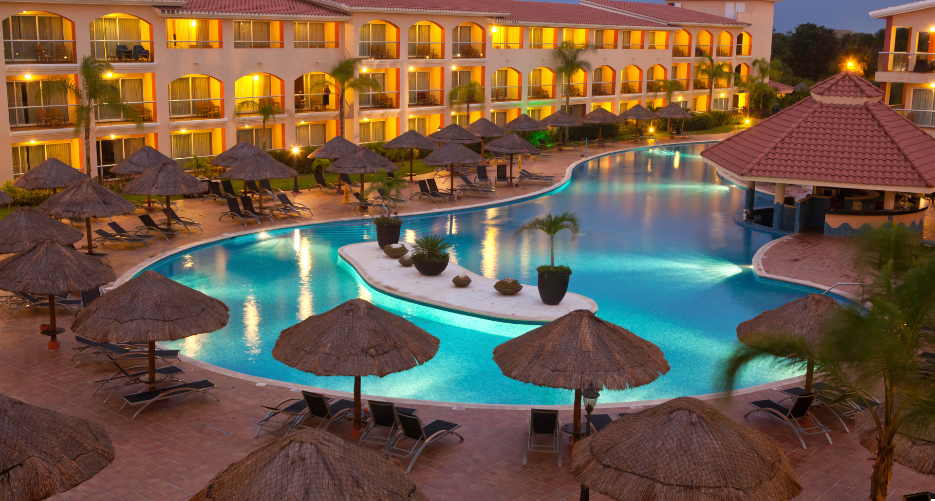 Luxury resort with a swimming pool and sun loungers