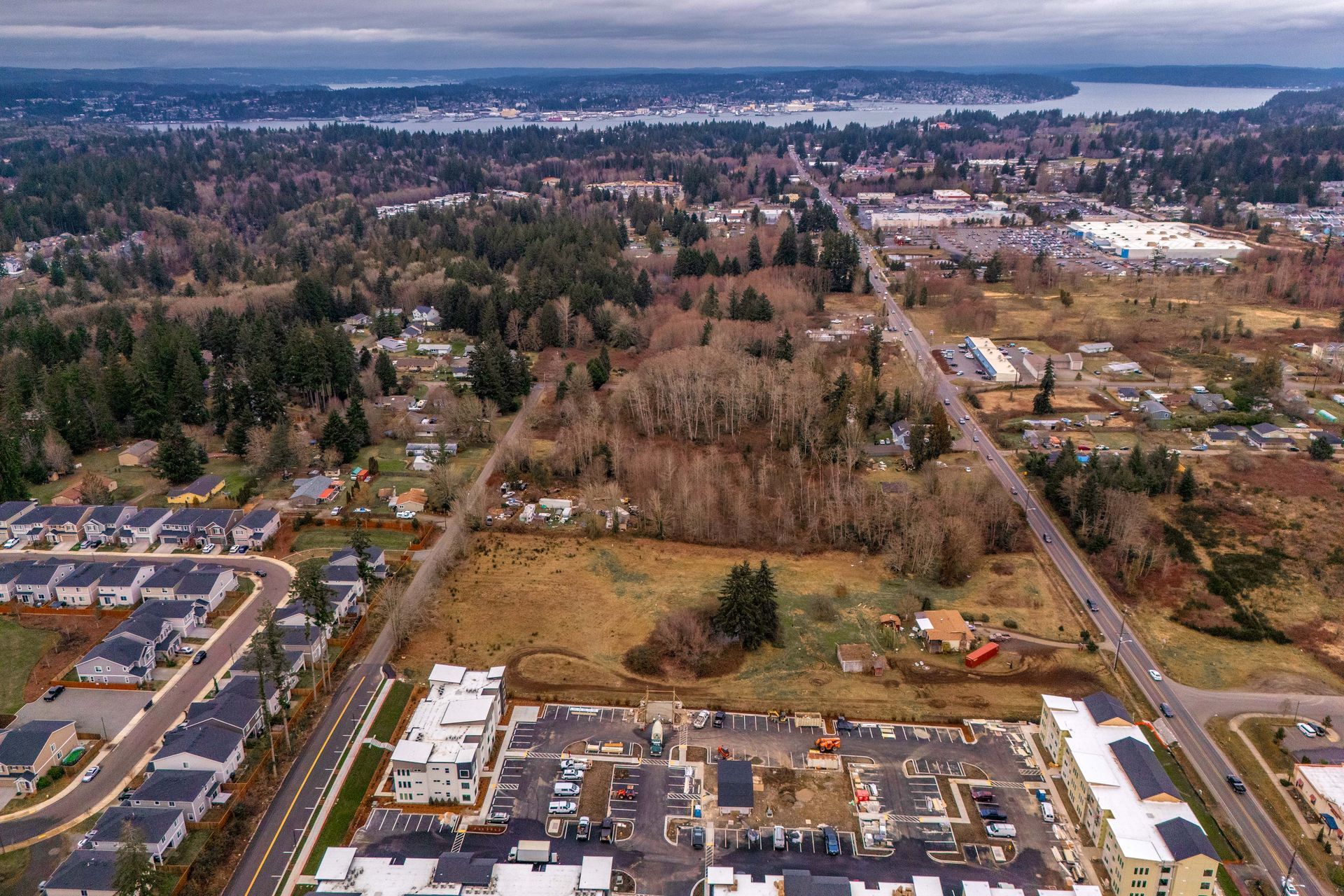 Aerial view of the Blueberry Apartments complex and surrounding Port Orchard neighborhood.