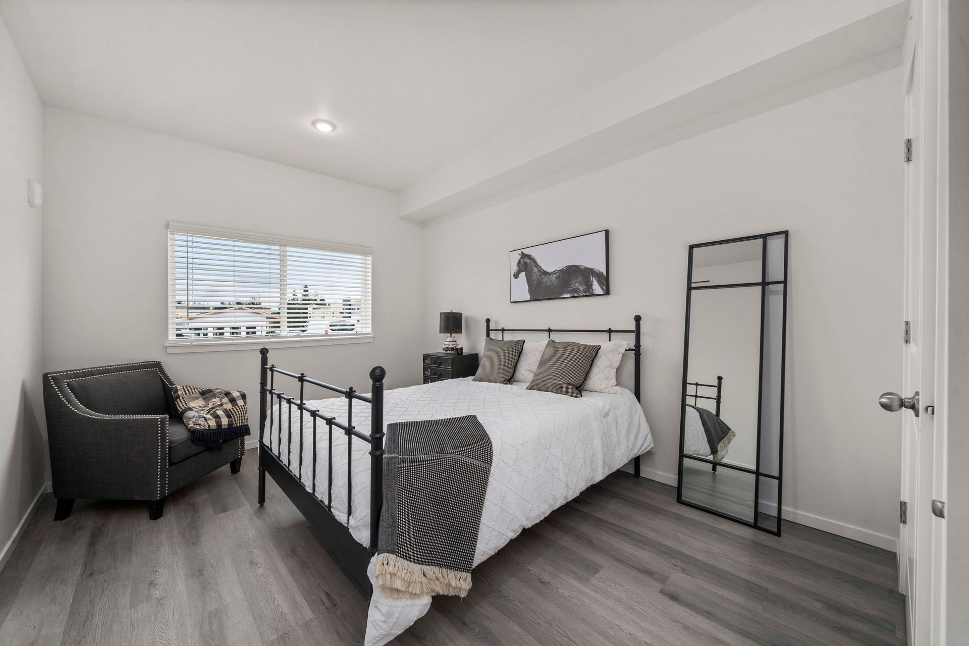Bedroom at Blueberry Apartments Port Orchard with view into closet.