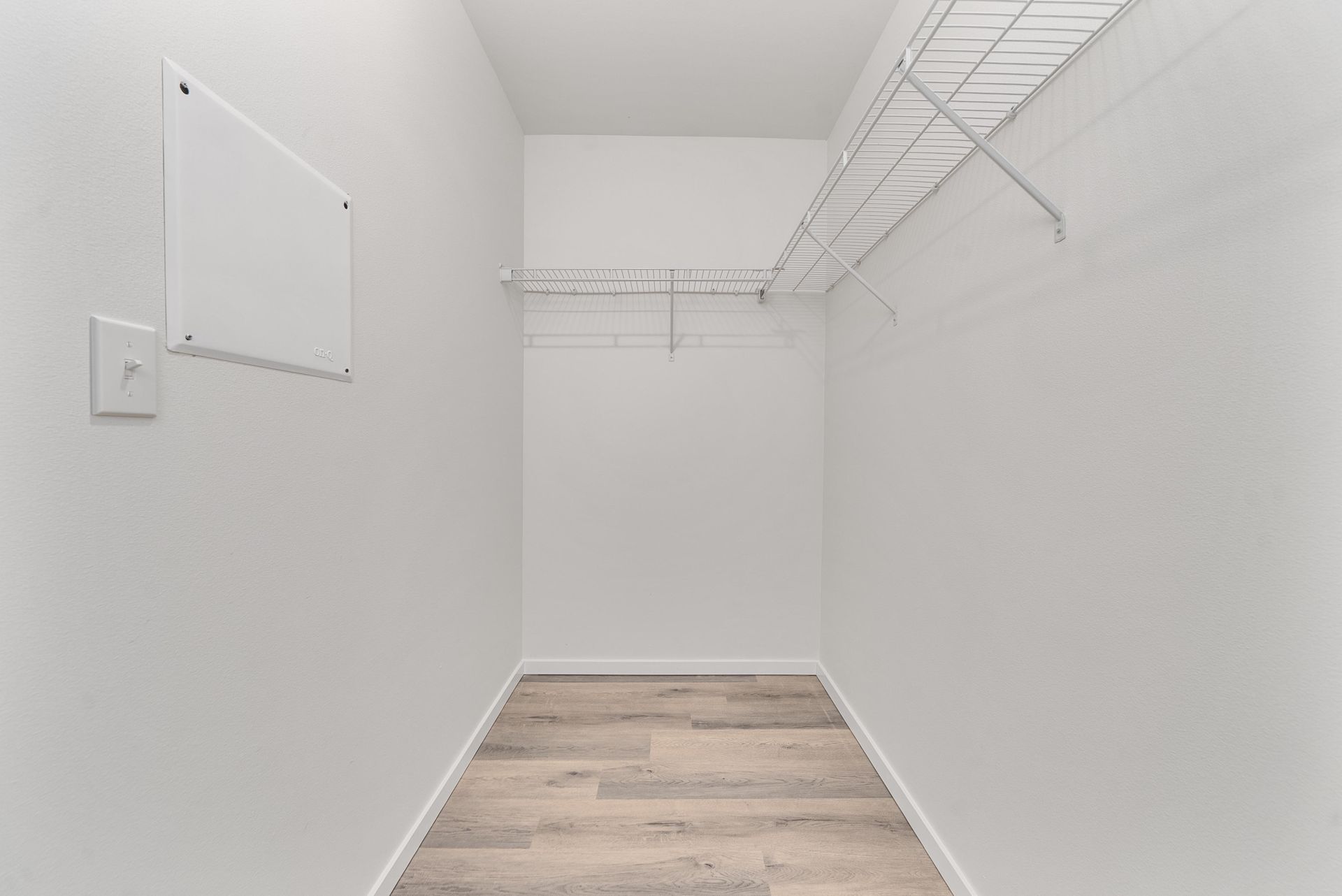 Walk-in closet with built-in shelving at Blueberry Apartments, Port Orchard