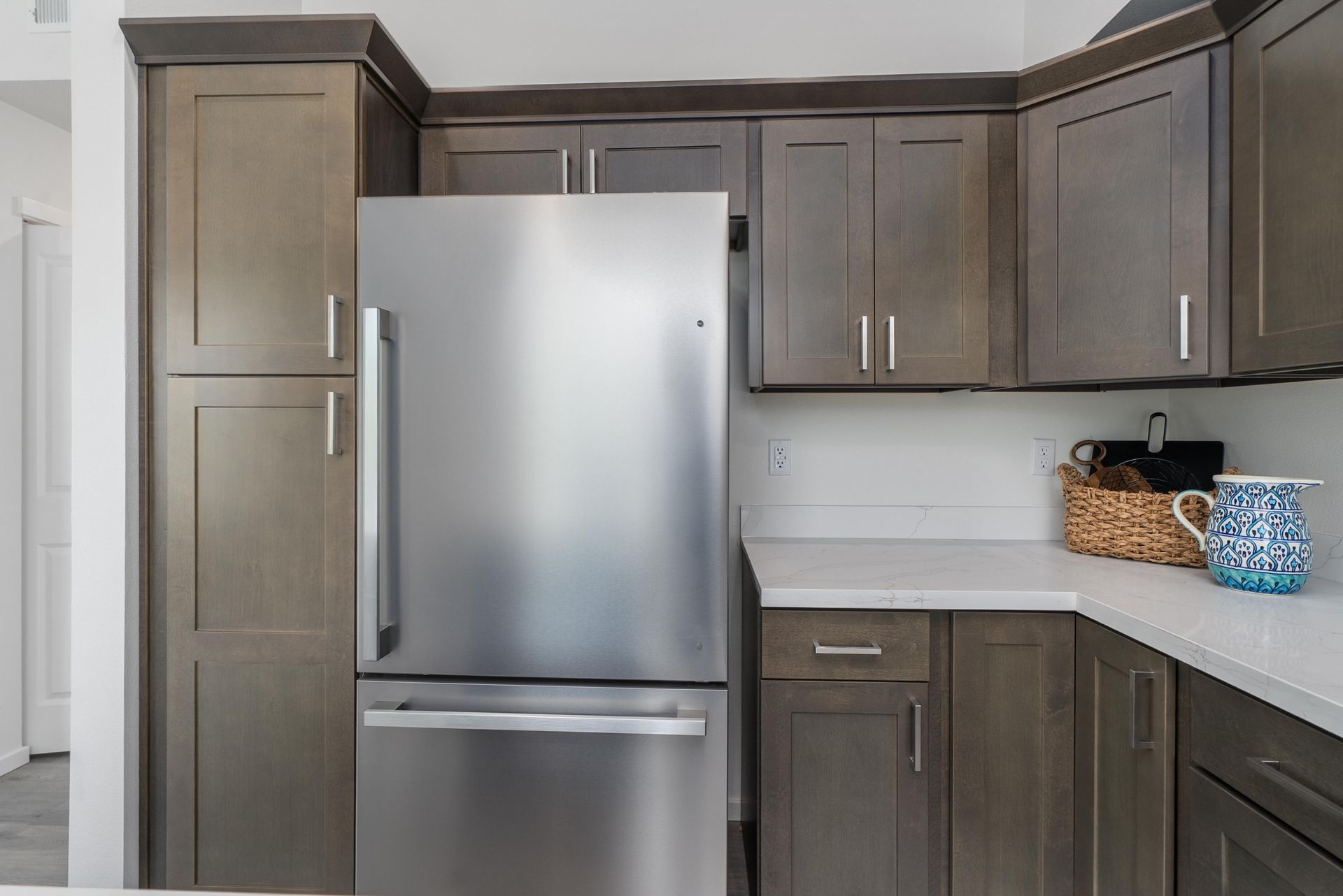 Stainless steel refrigerator in a kitchen at Blueberry Apartments, Port Orchard