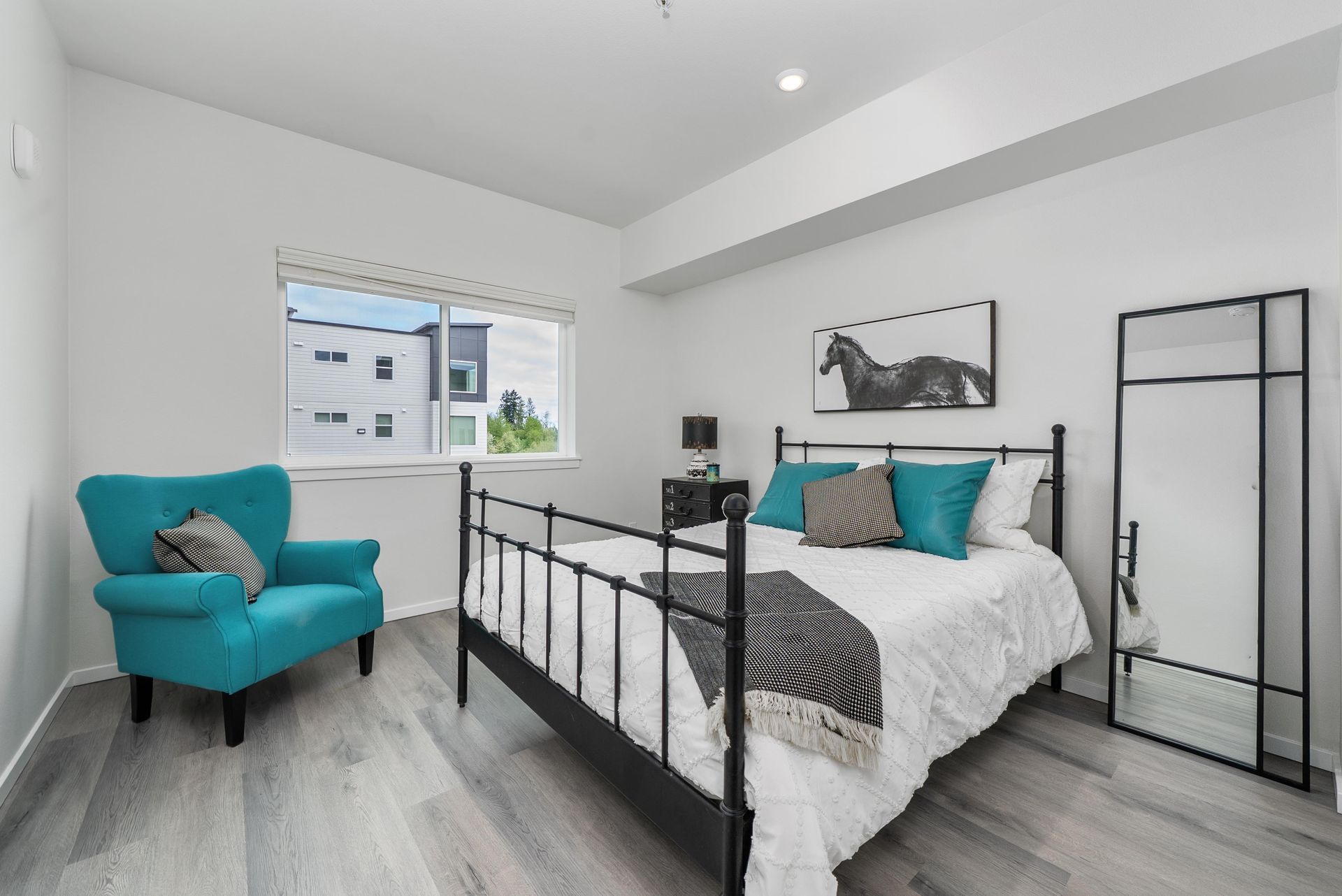 Bedroom with large windows and bright light at Blueberry Apartments Port Orchard rentals