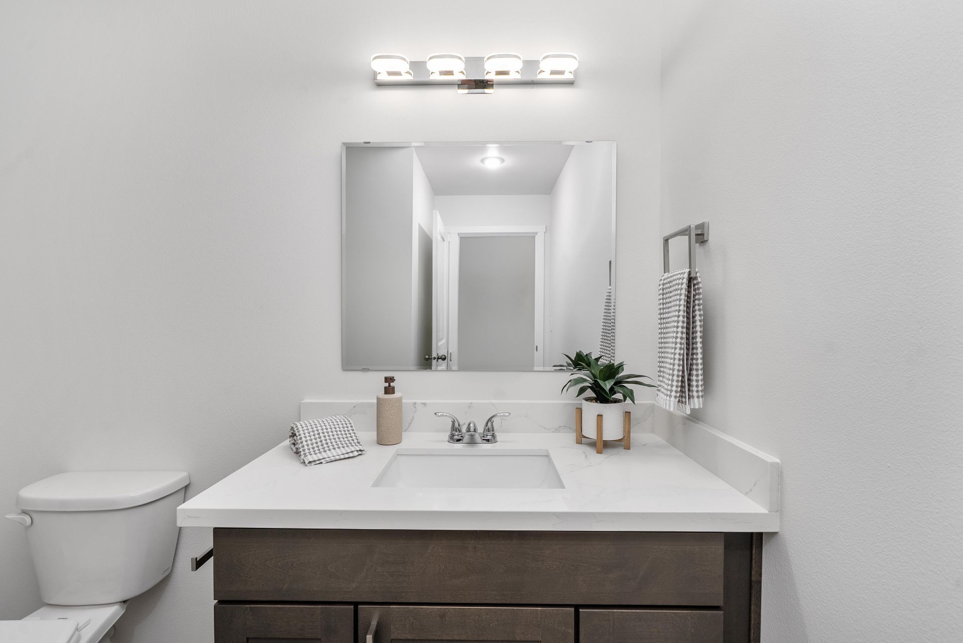 Bathroom vanity and mirror detail at Blueberry Apartments Port Orchard