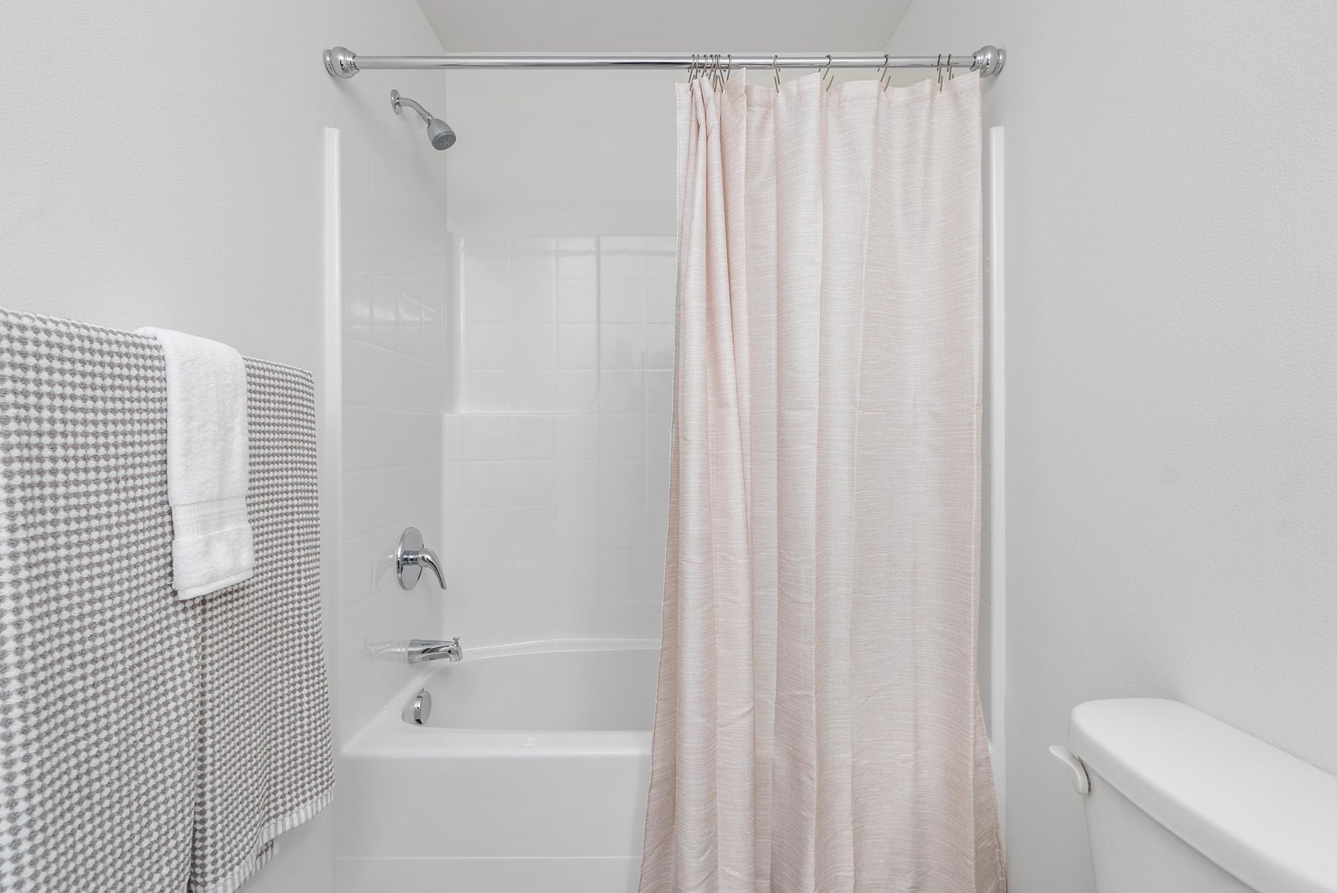 Bathroom with shower/tub combo at Blueberry Apartments rentals in Port Orchard