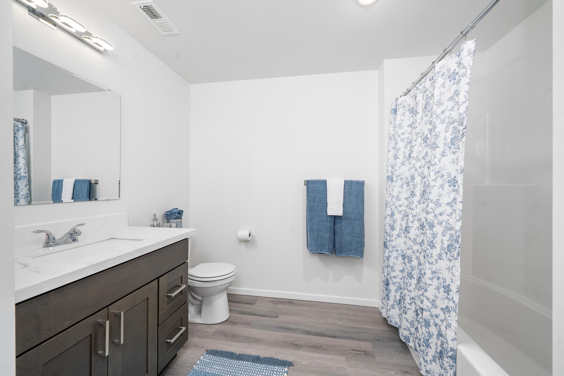 Bathroom with shower and toilet at Blueberry Apartments rentals, Port Orchard