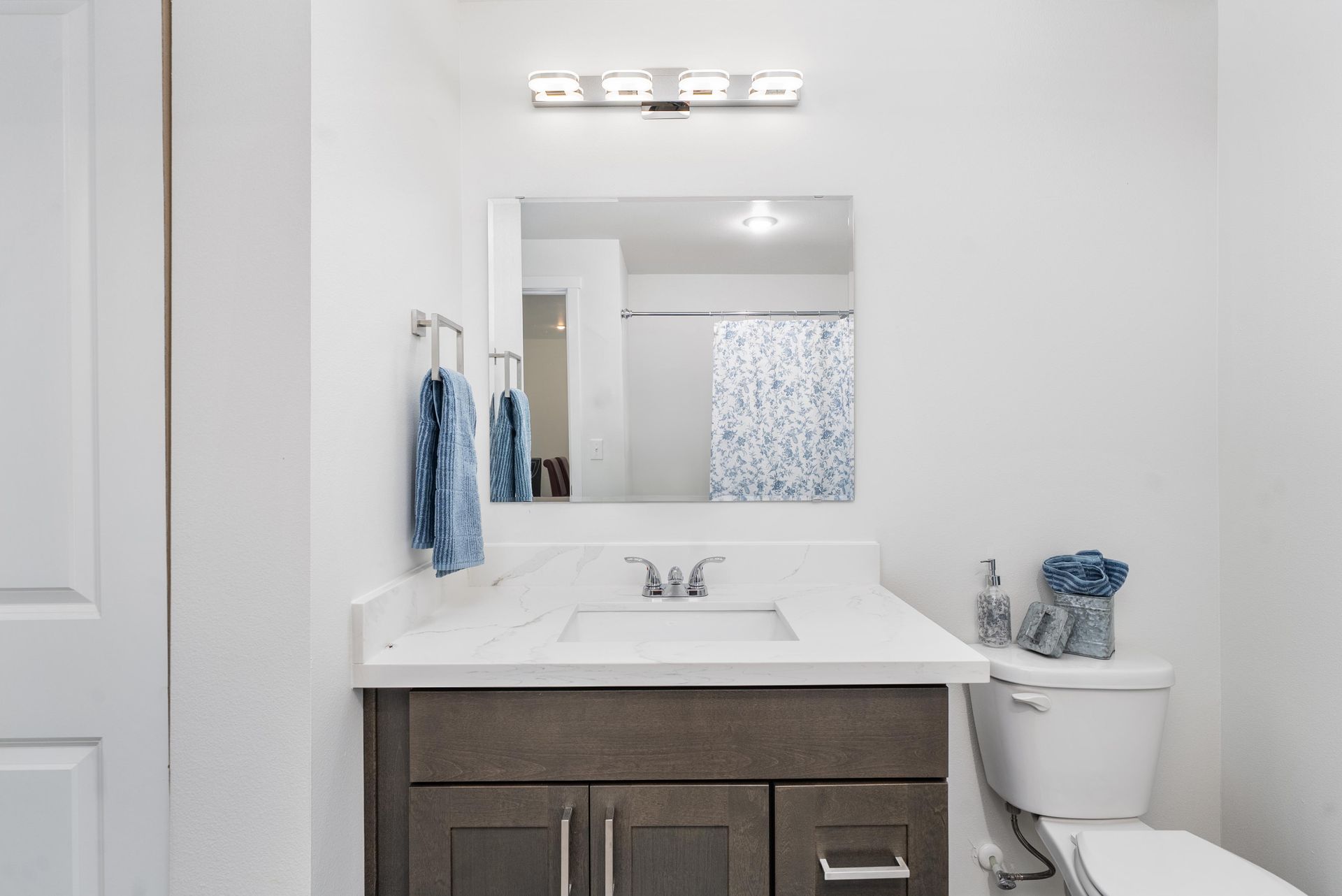 Bathroom vanity and mirror at Blueberry Apartments Port Orchard rentals
