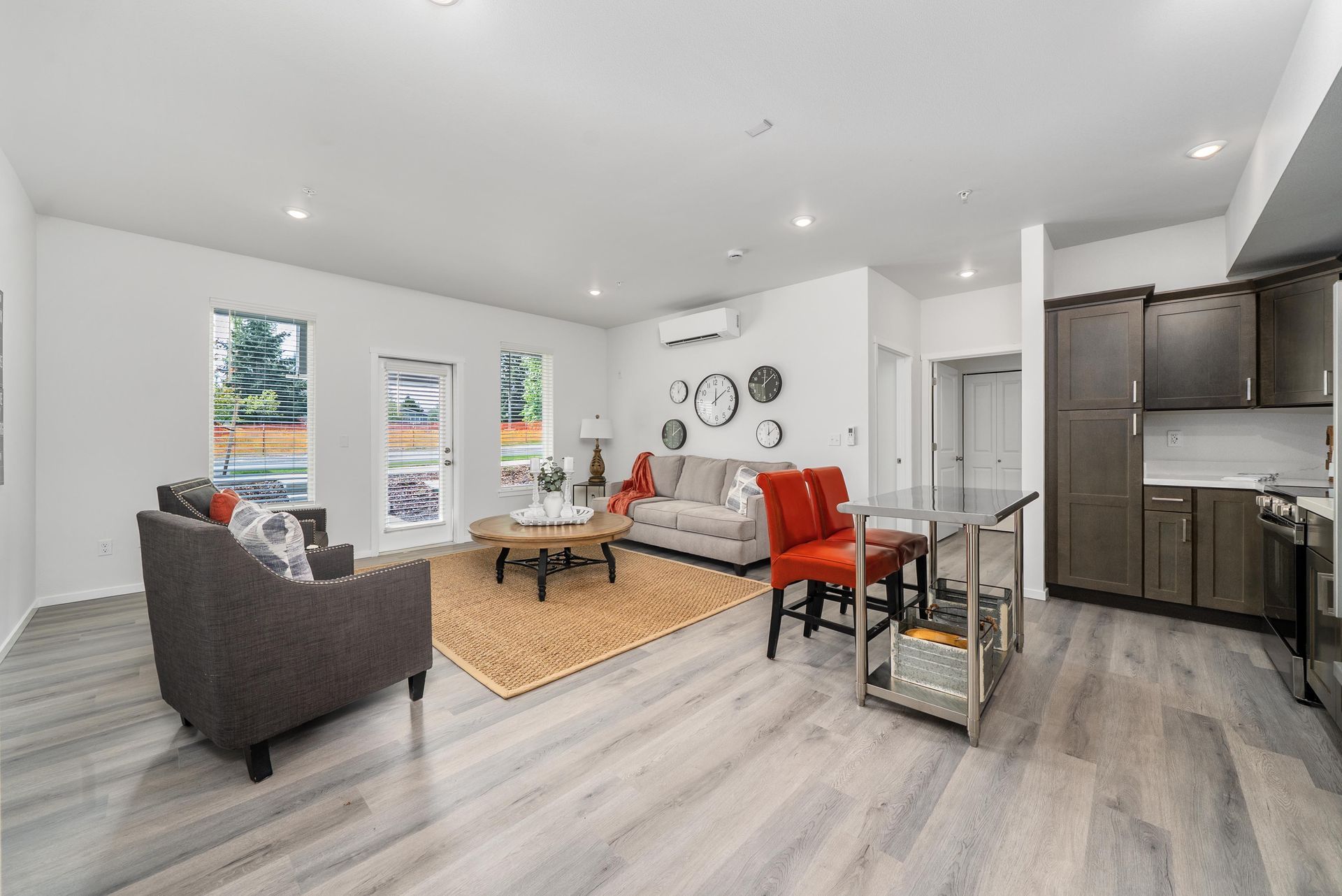 Living room with vinyl plank flooring at Blueberry Apartments rentals, Port Orchard
