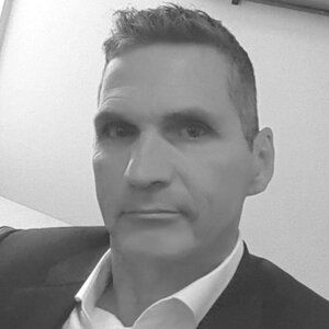 A black and white headshot of Daniel Gagnon