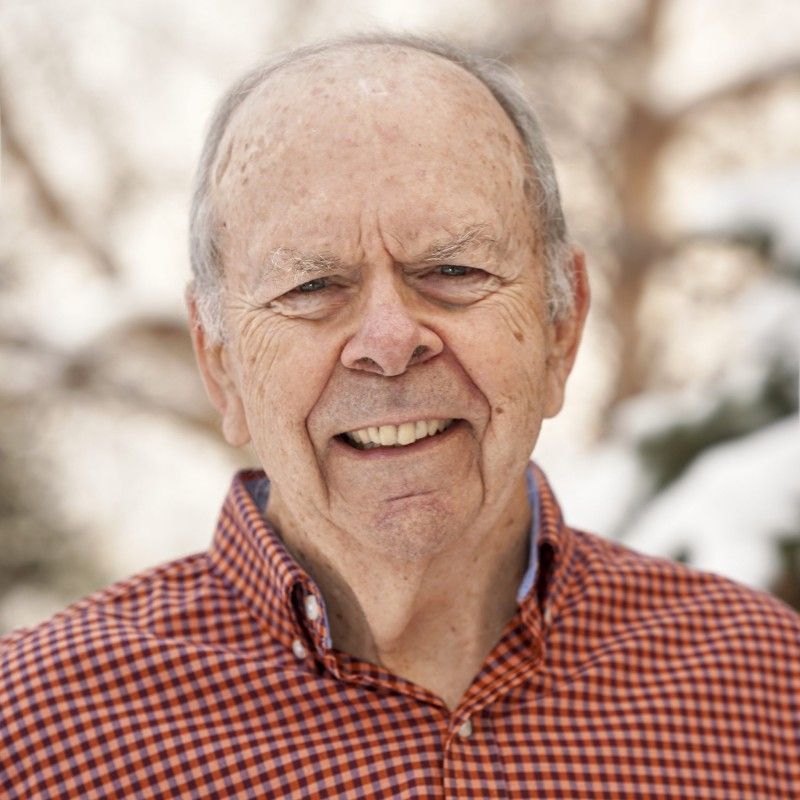 Photo of Jim Highsmith wearing orange checked dress shirt