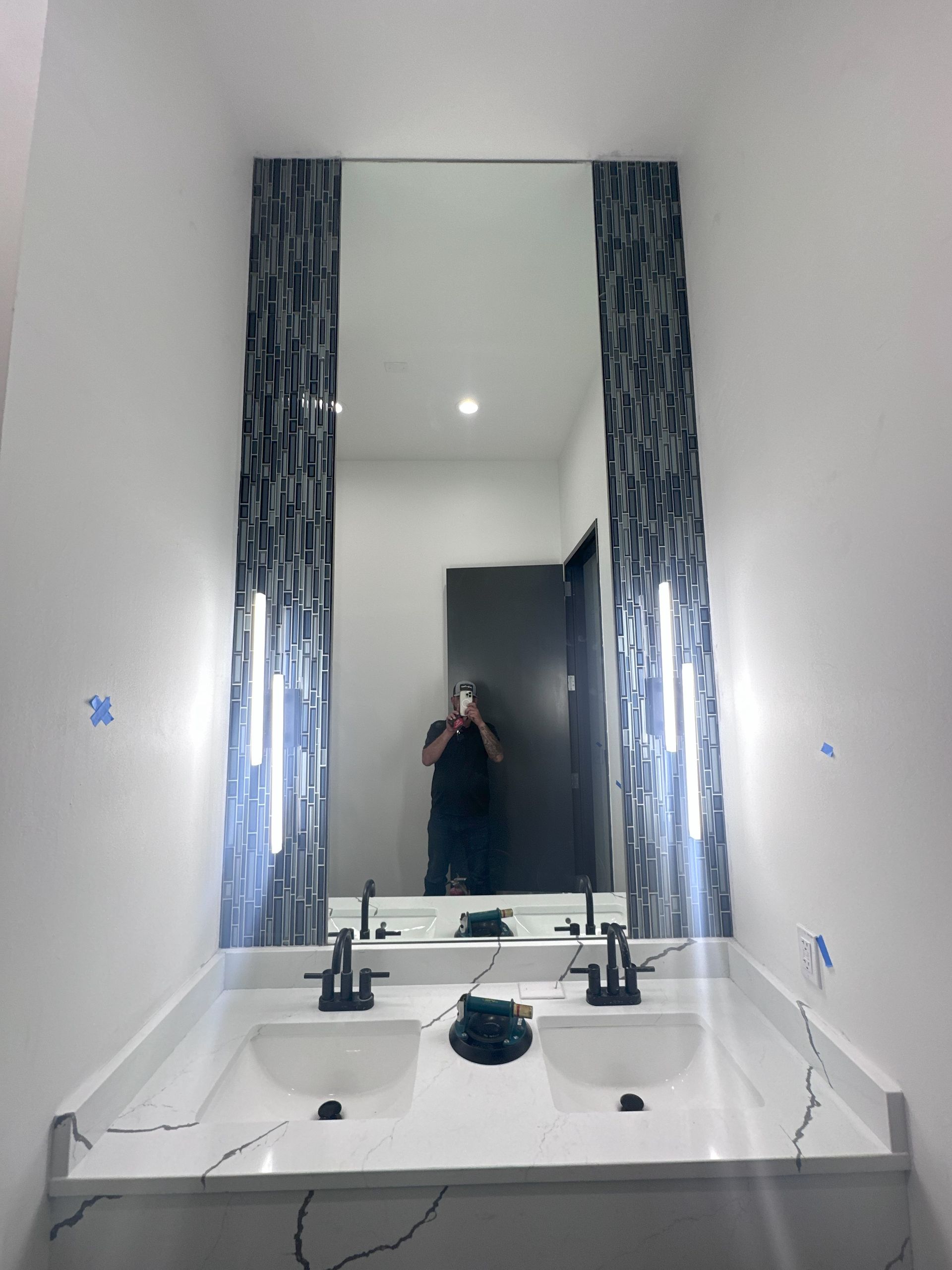 Large wall mirror professionally installed