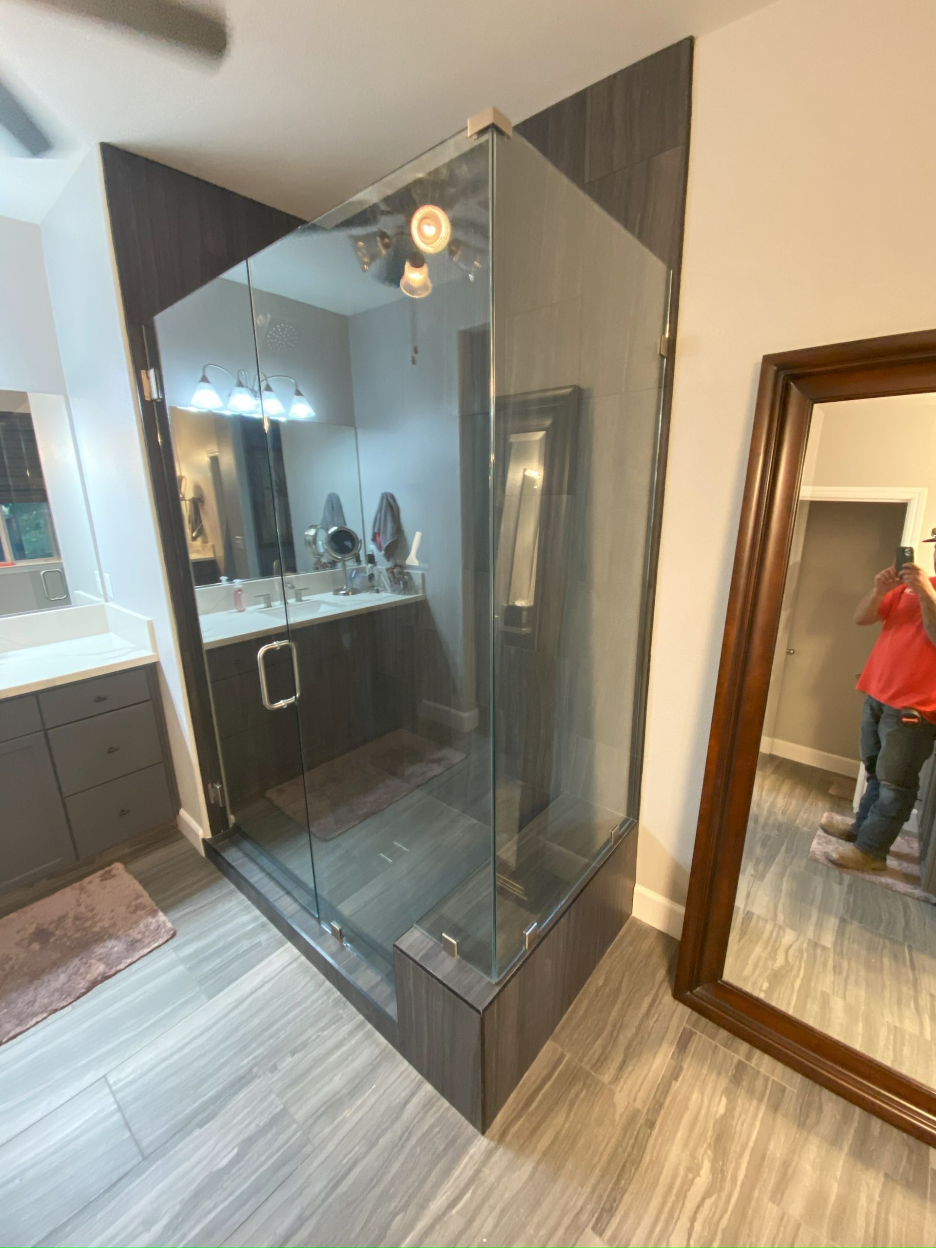 Contemporary shower design with custom glass panels