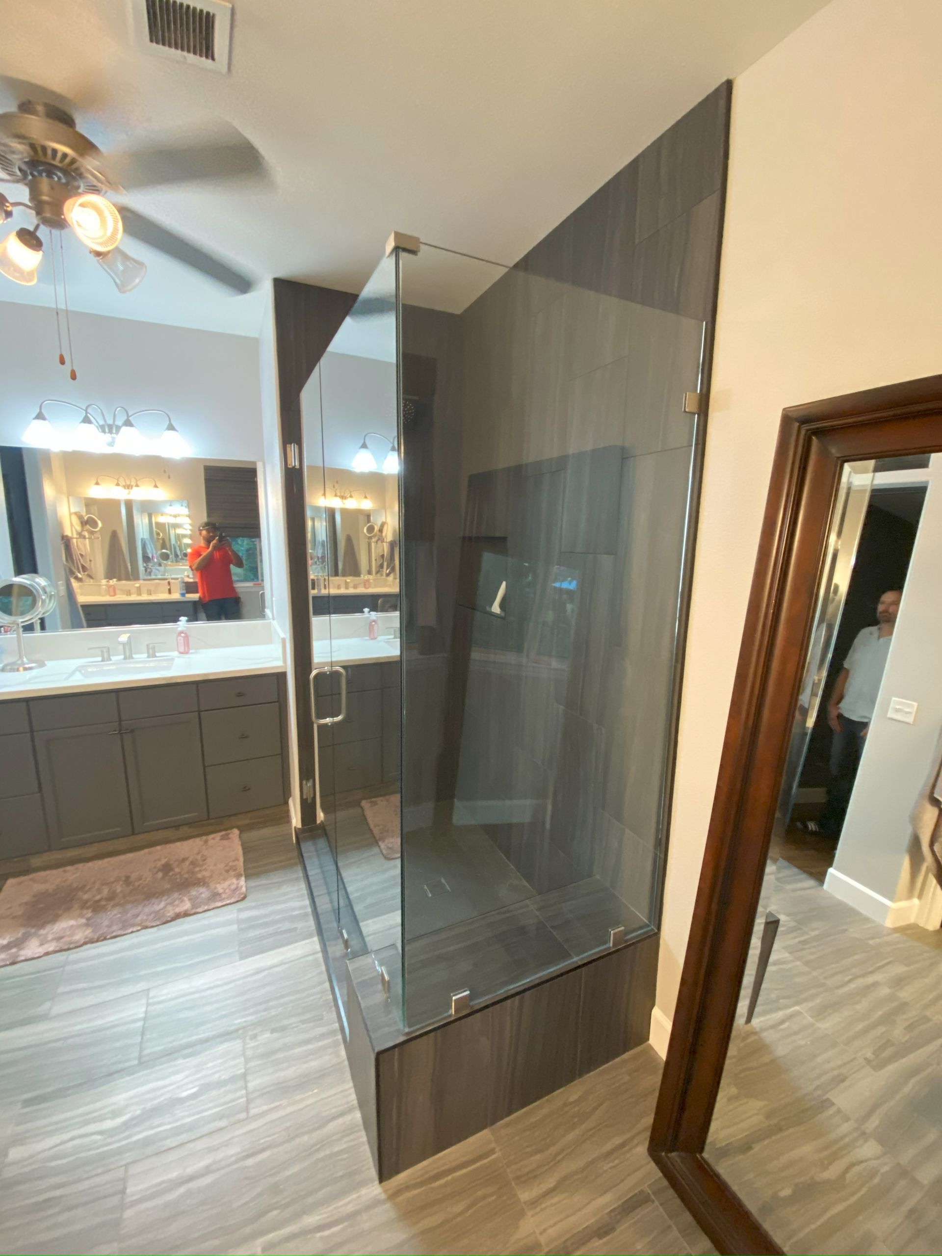 Contemporary shower design with custom glass panels