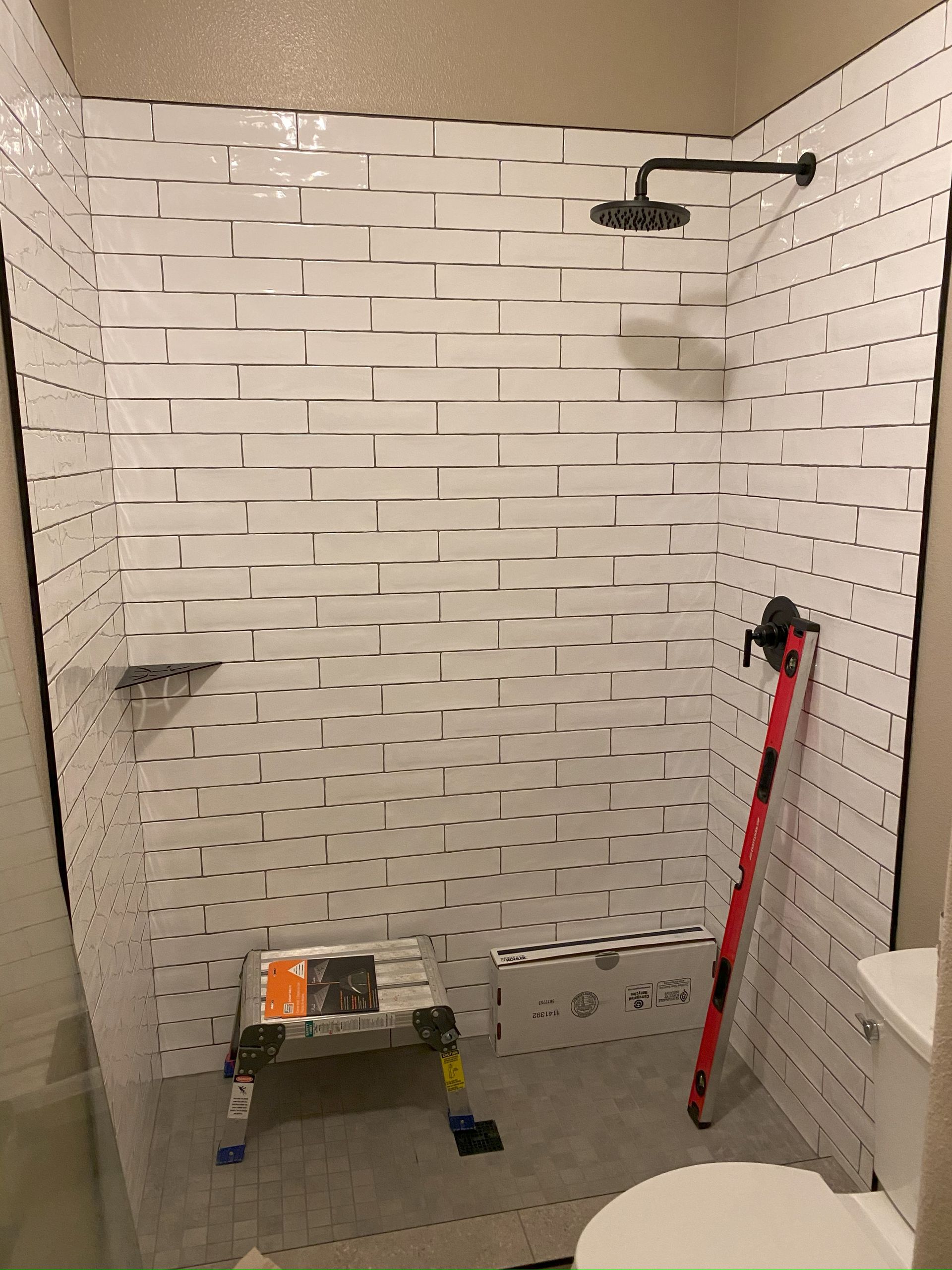 Frameless glass shower enclosure installed in San Antonio bathroom