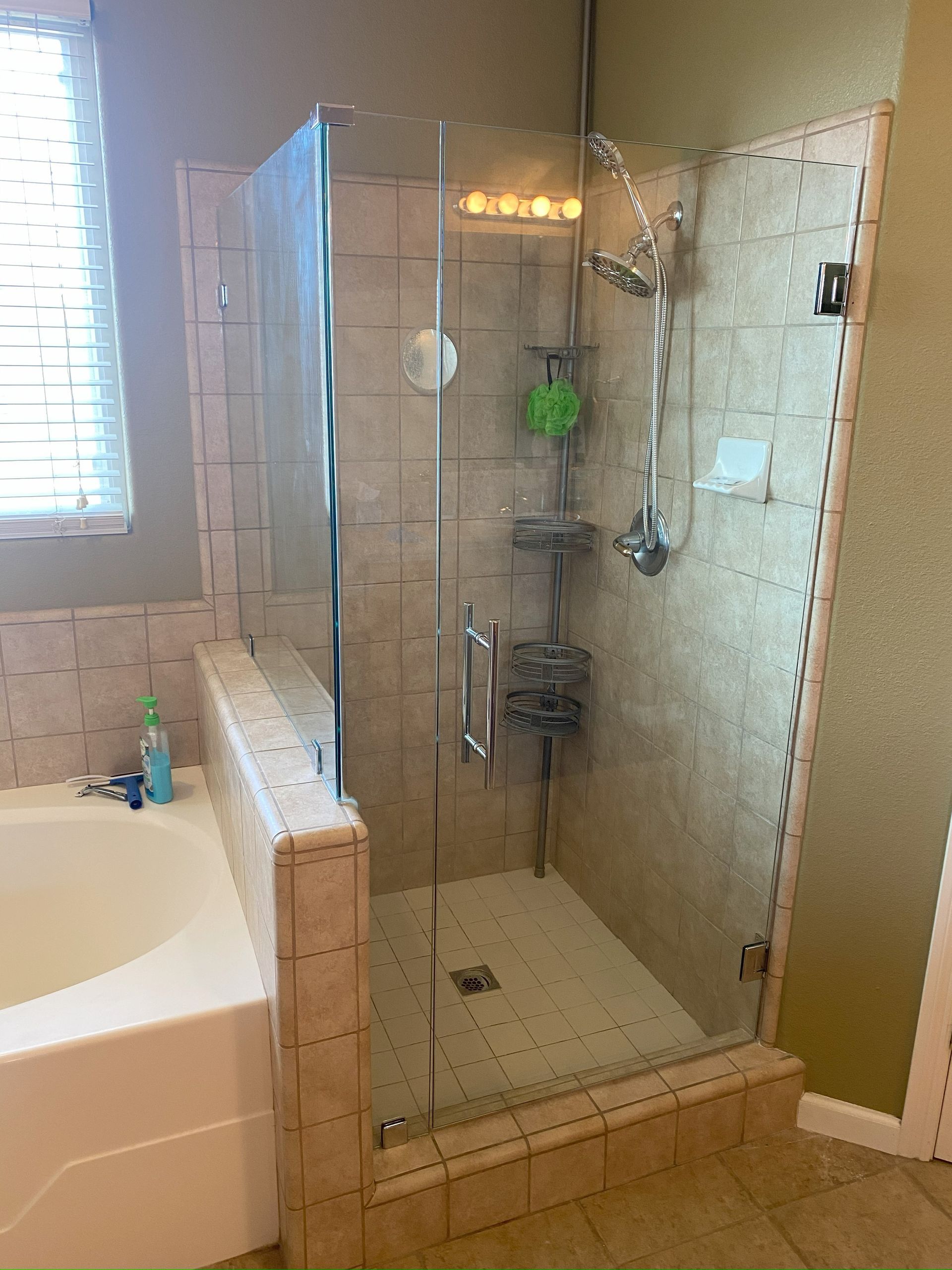 High-end glass shower system by Glassology with professional glazing and smooth edge finishing