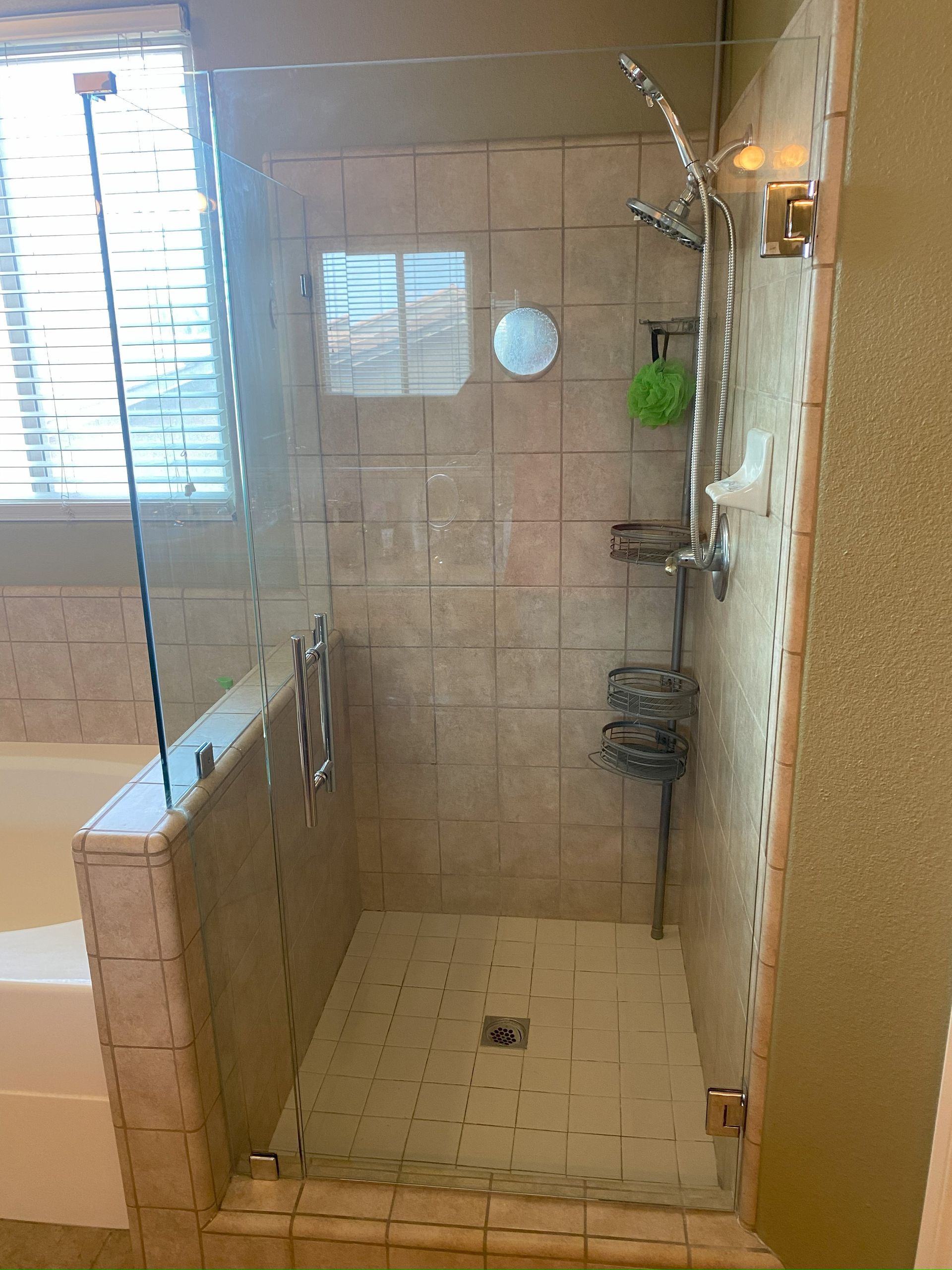 Contemporary shower design with custom glass panels