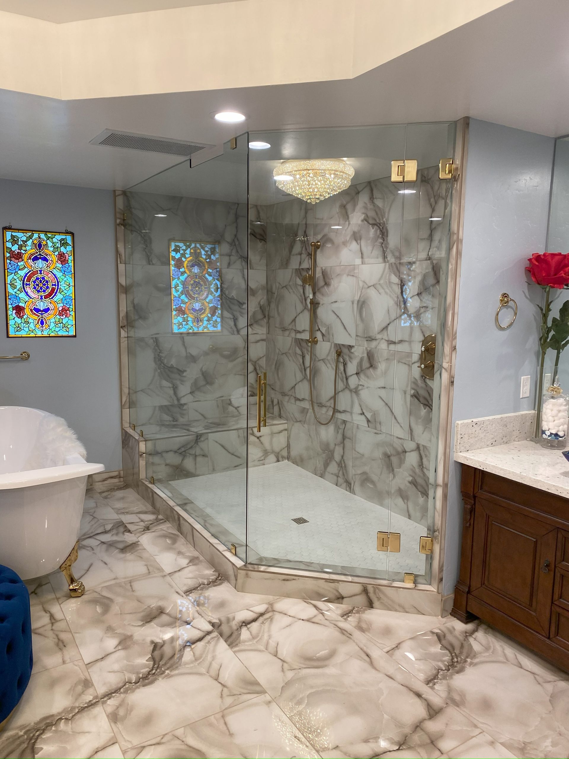 High-end glass shower system by Glassology with professional glazing and smooth edge finishing