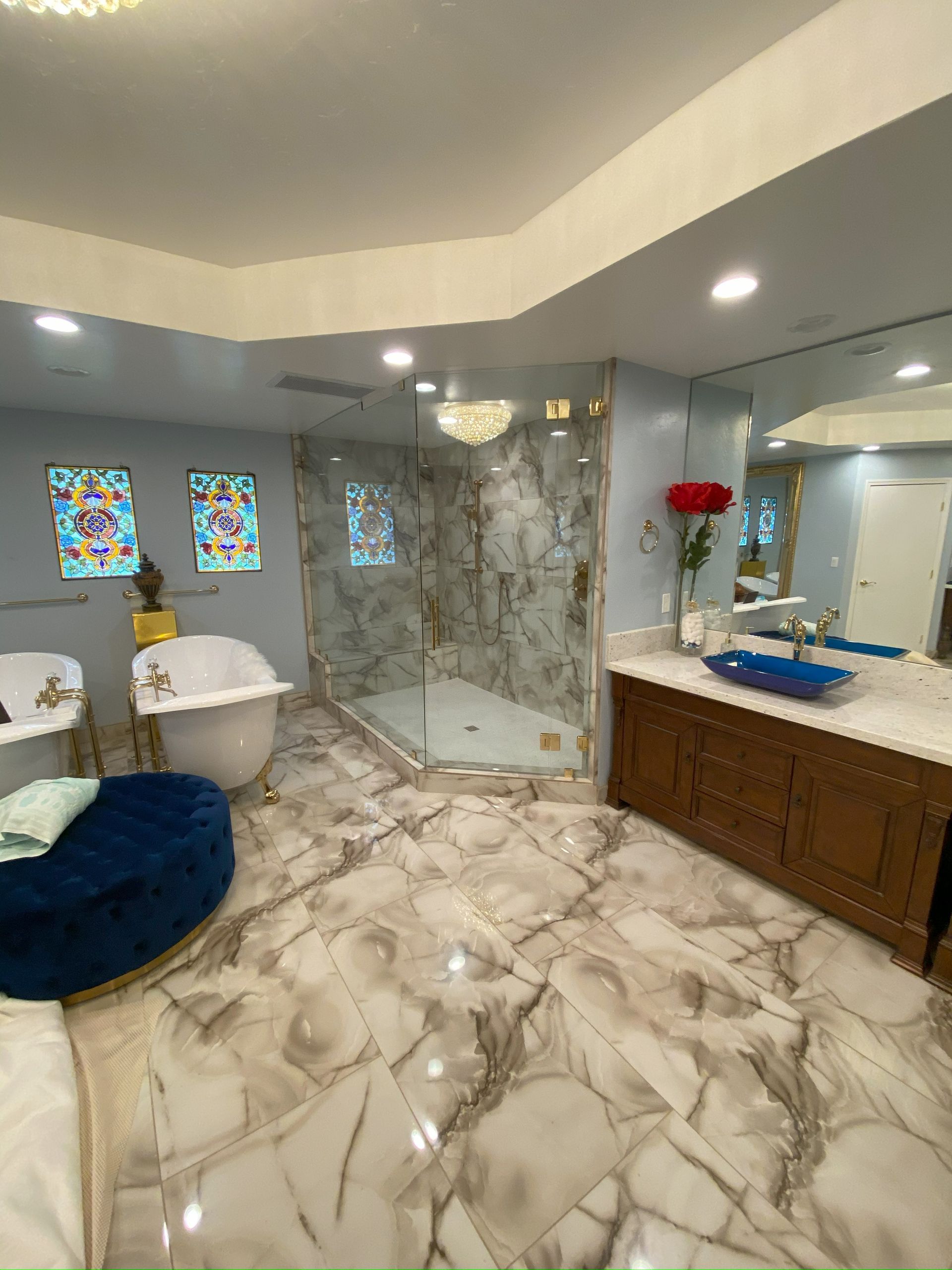 Modern bathroom with clear frameless glass shower panels