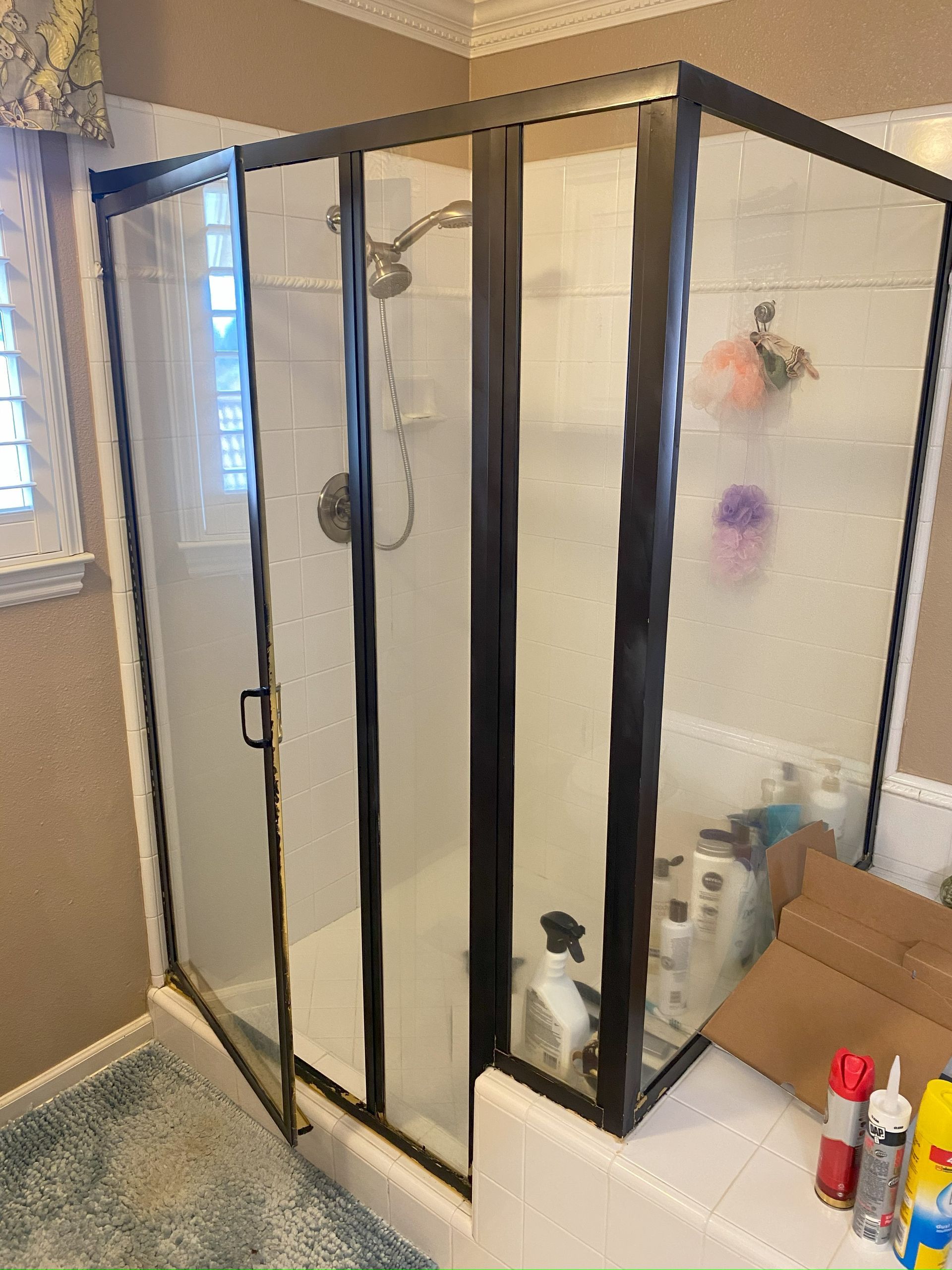 Luxury frameless shower door installation in residential home
