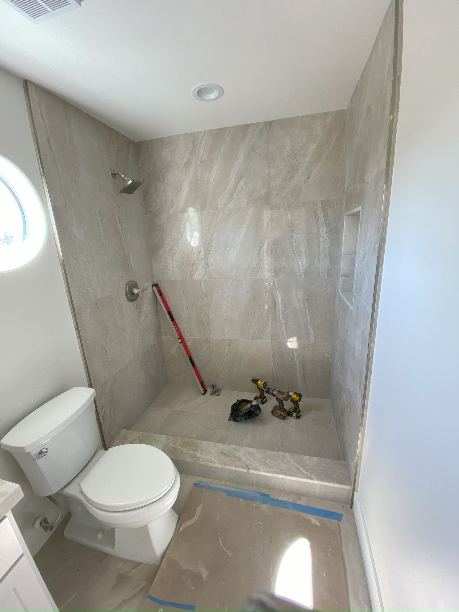 Custom frameless shower glass installation by Glassology in San Antonio TX