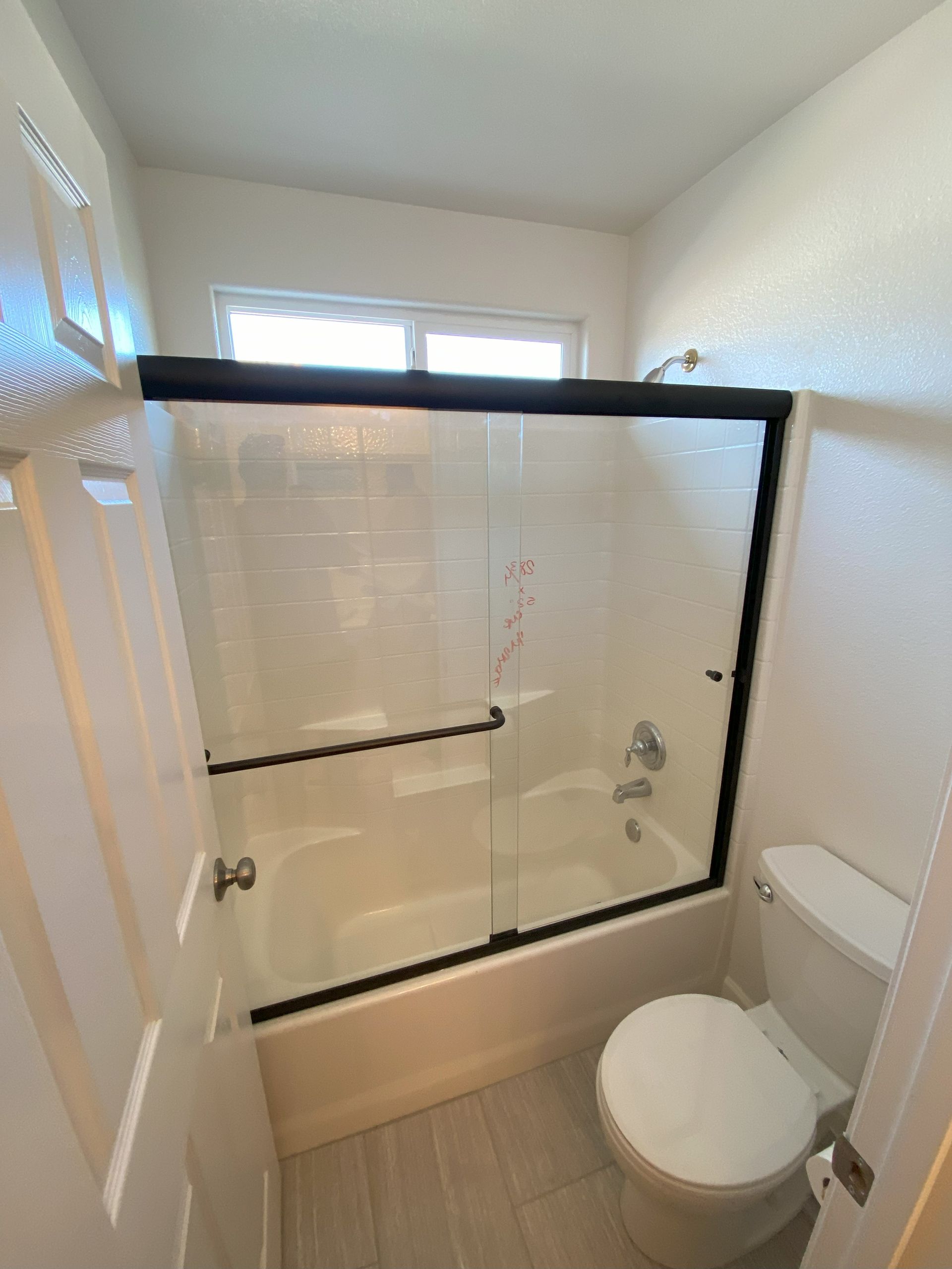 High-end bathroom remodel featuring frameless shower glass
