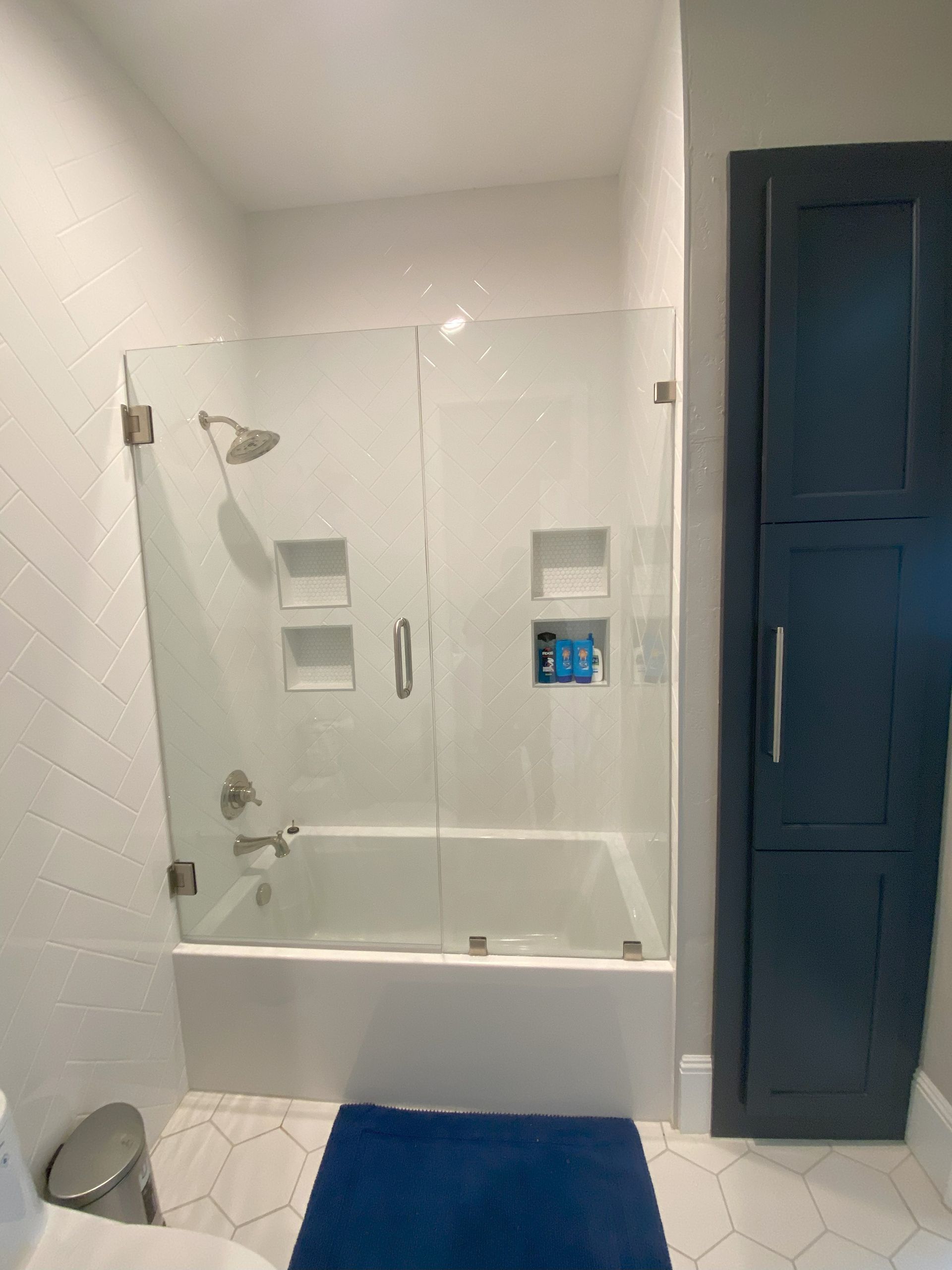 Premium frameless glass enclosure by Glassology with clean seams and minimal fittings
