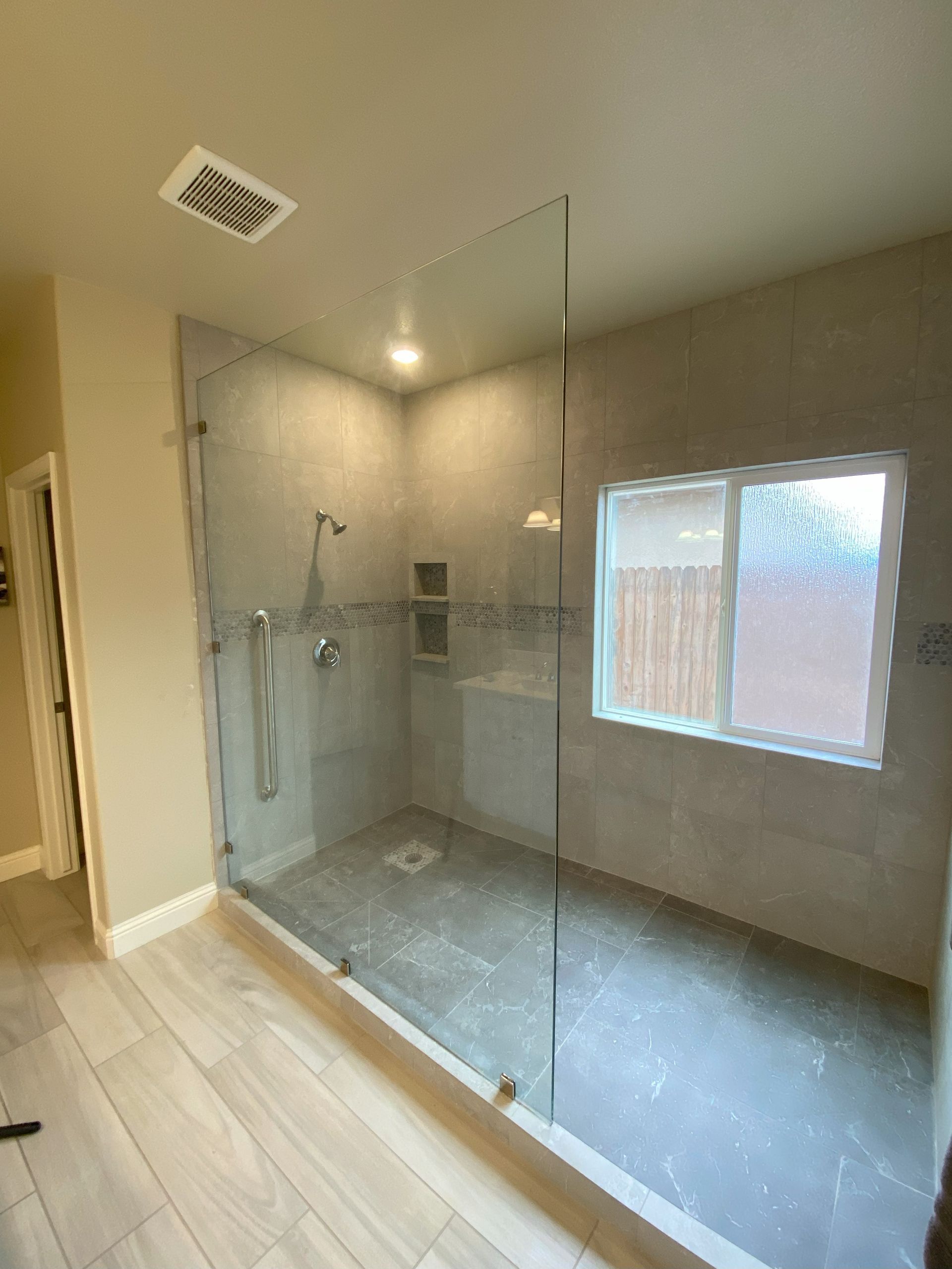 High-clarity tempered glass panel by Glassology with smooth polished edges
