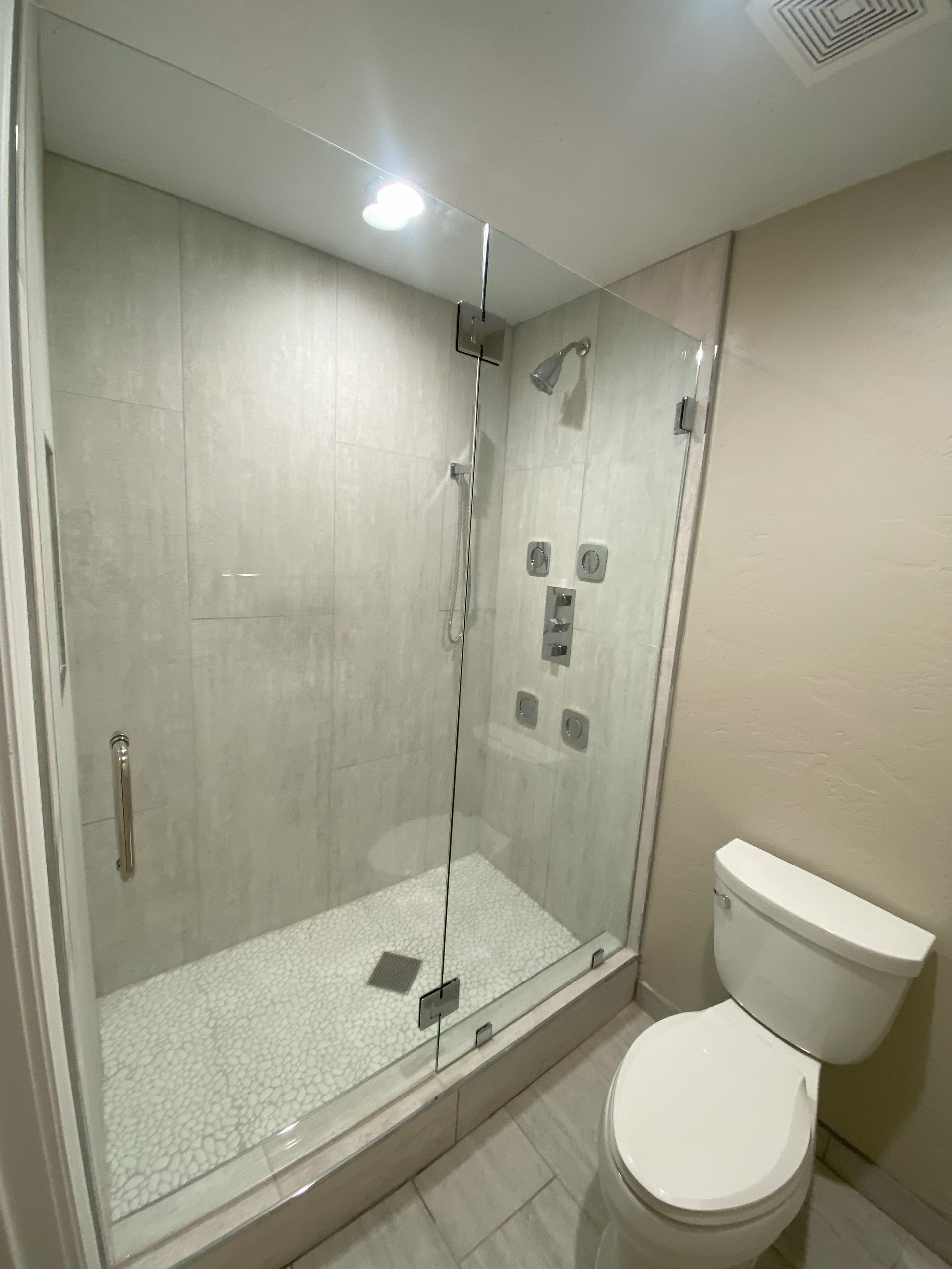 Premium tempered glass enclosure by Glassology with refined edge work and tight tolerances
