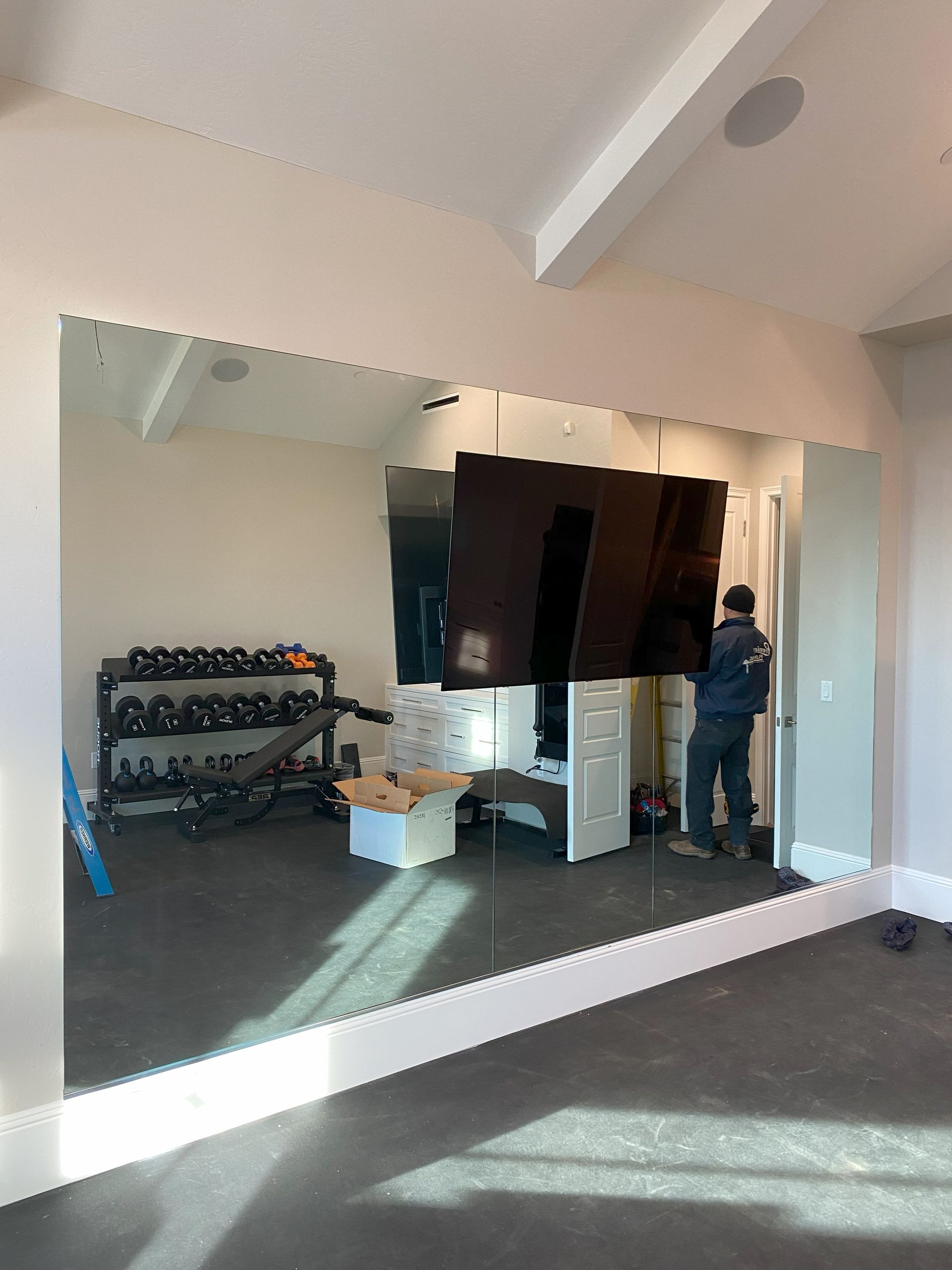 Large wall mirror professionally installed