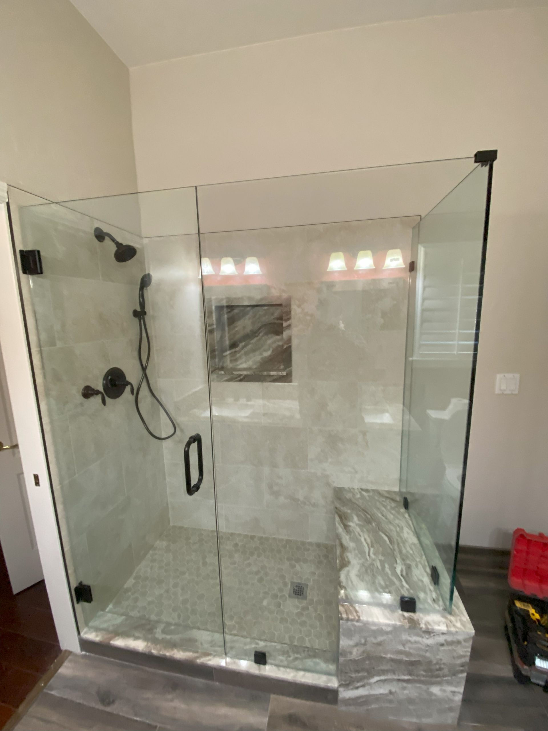 Polished glass surface by Glassology designed for long-lasting clarity and easy maintenance
