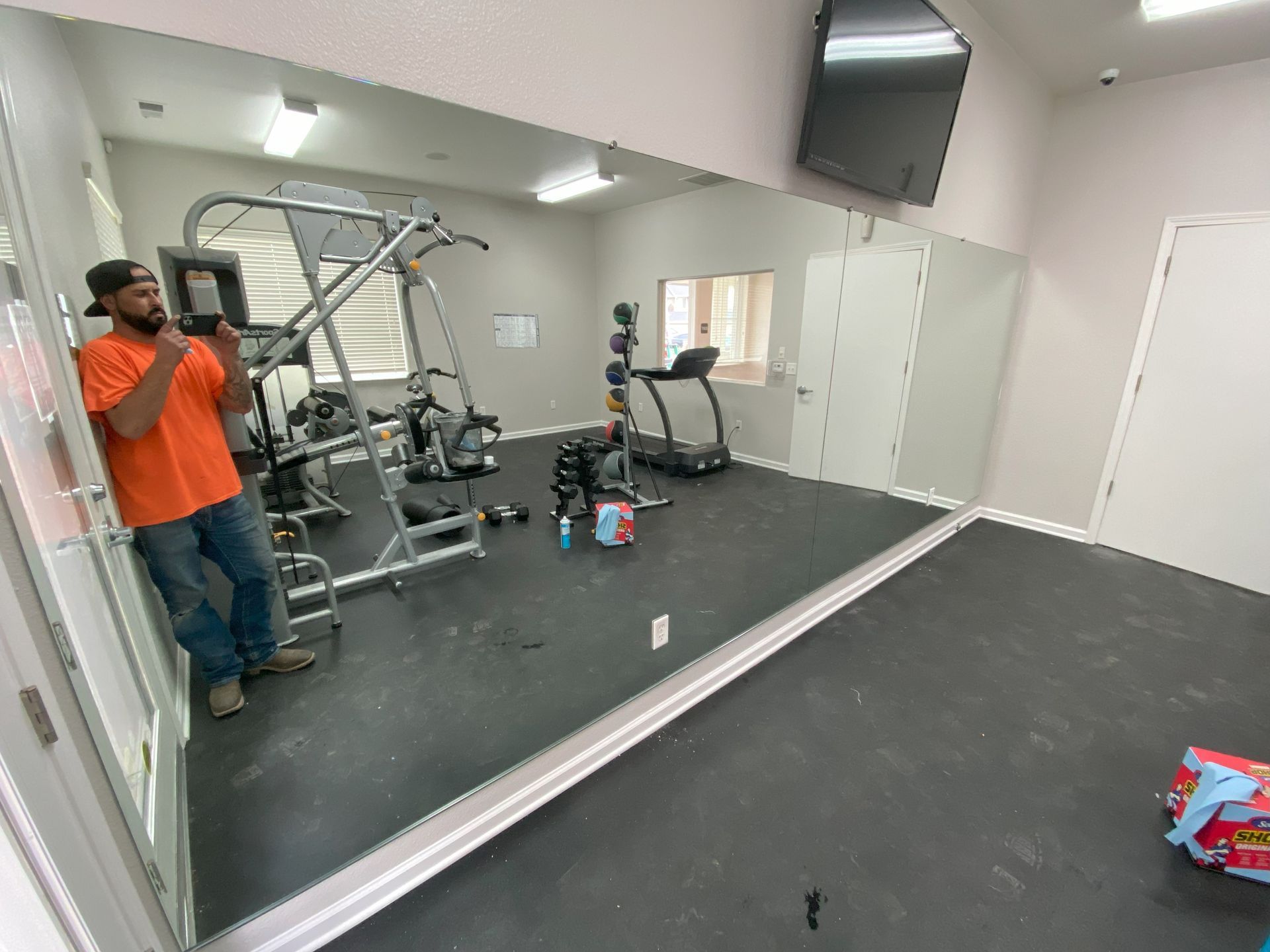 Gym wall mirror installation