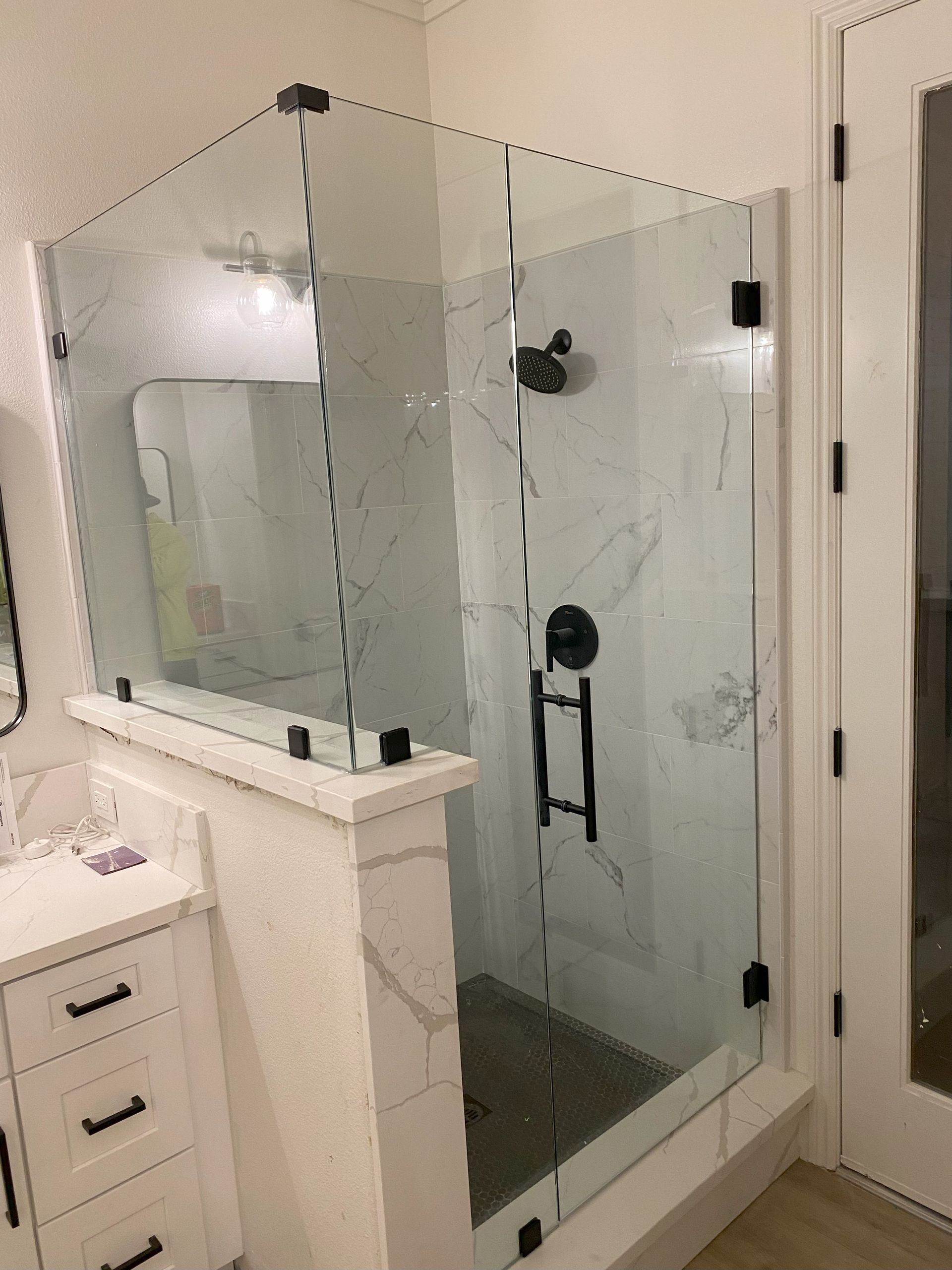 Crystal-clear glass enclosure by Glassology with a smooth, high-clarity finish
