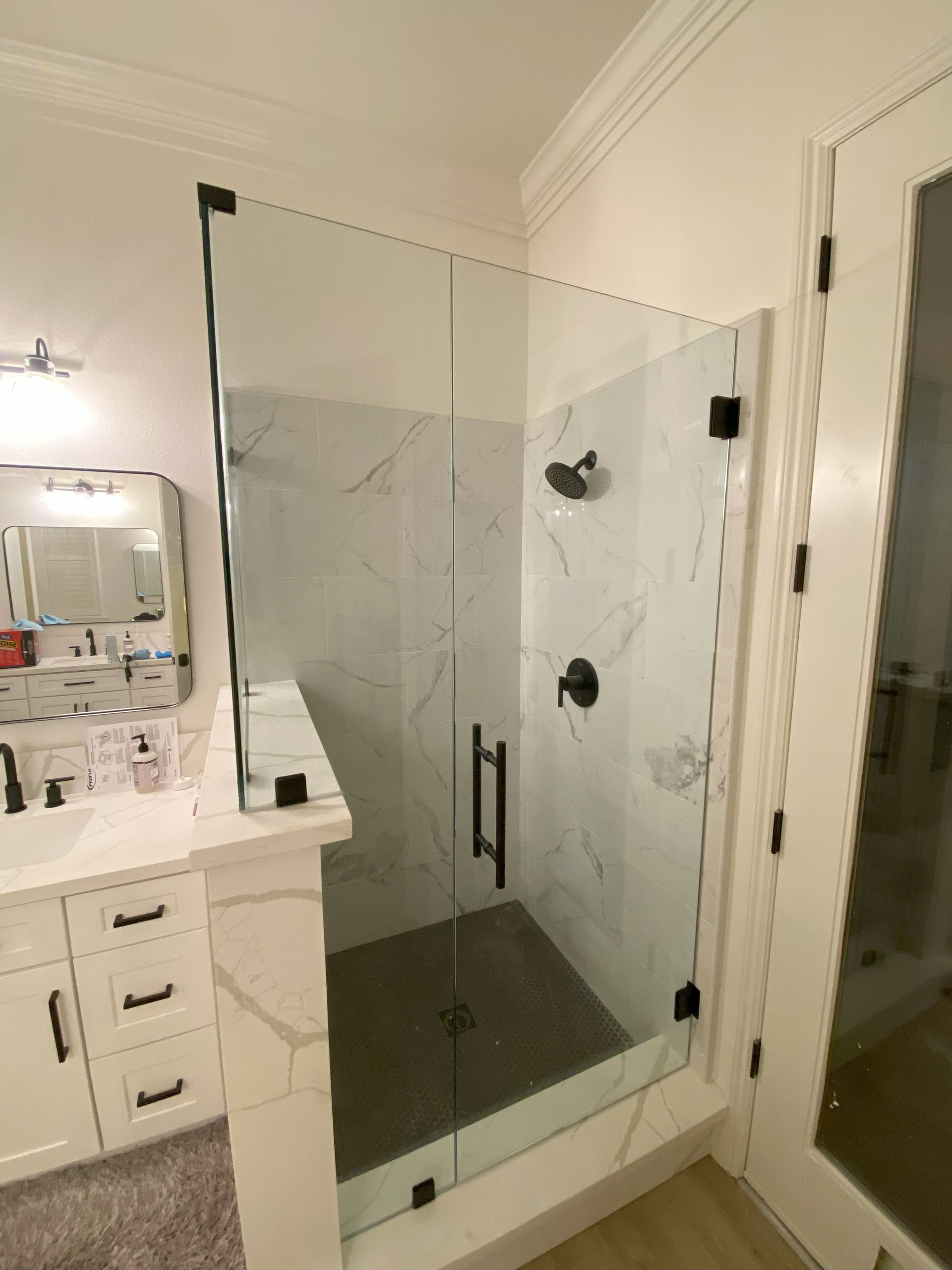 Custom glass shower by Glassology featuring clean glazing and enhanced clarity
