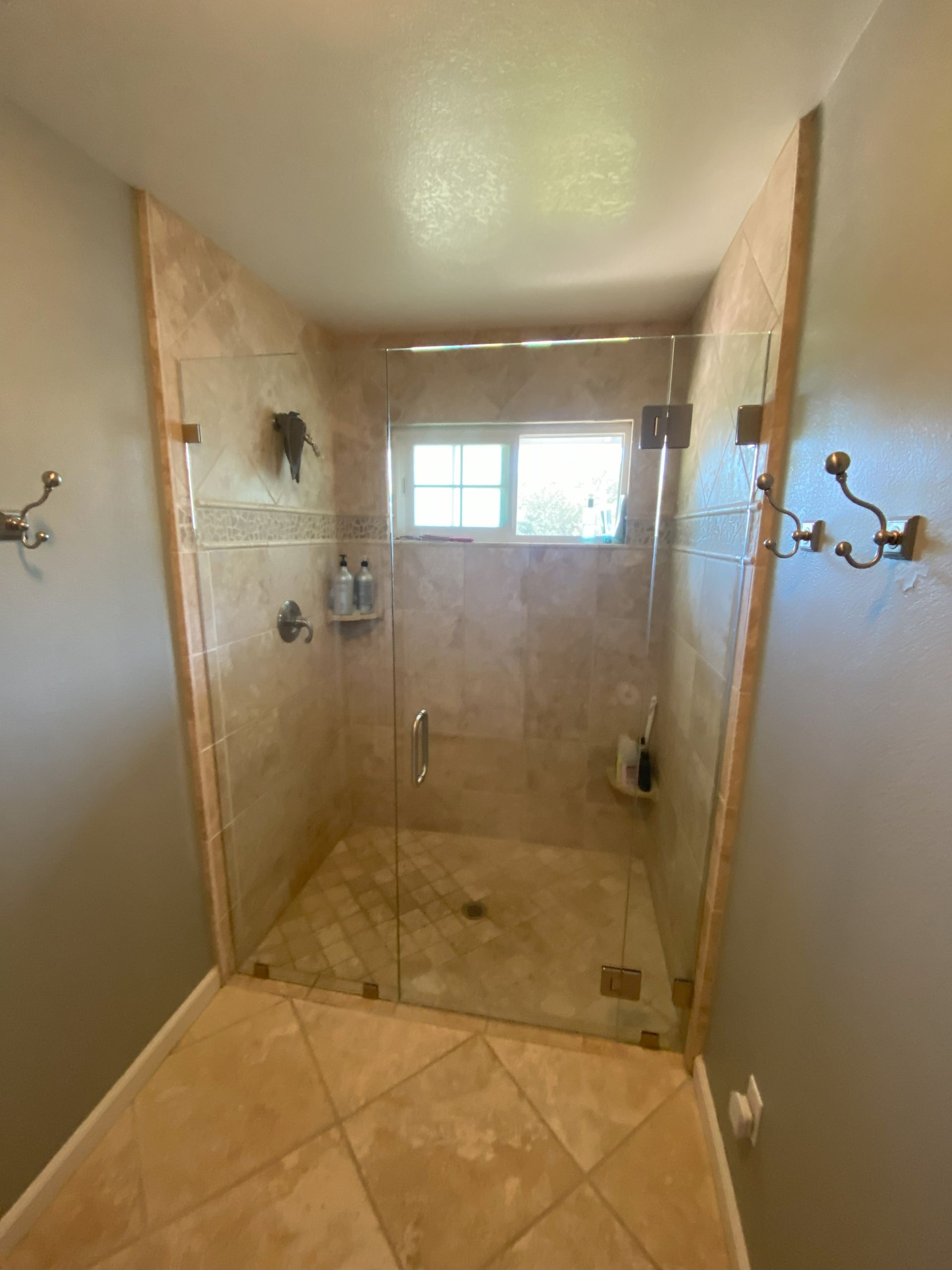 Custom glass work by Glassology with seamless panel transitions and clean glazed lines