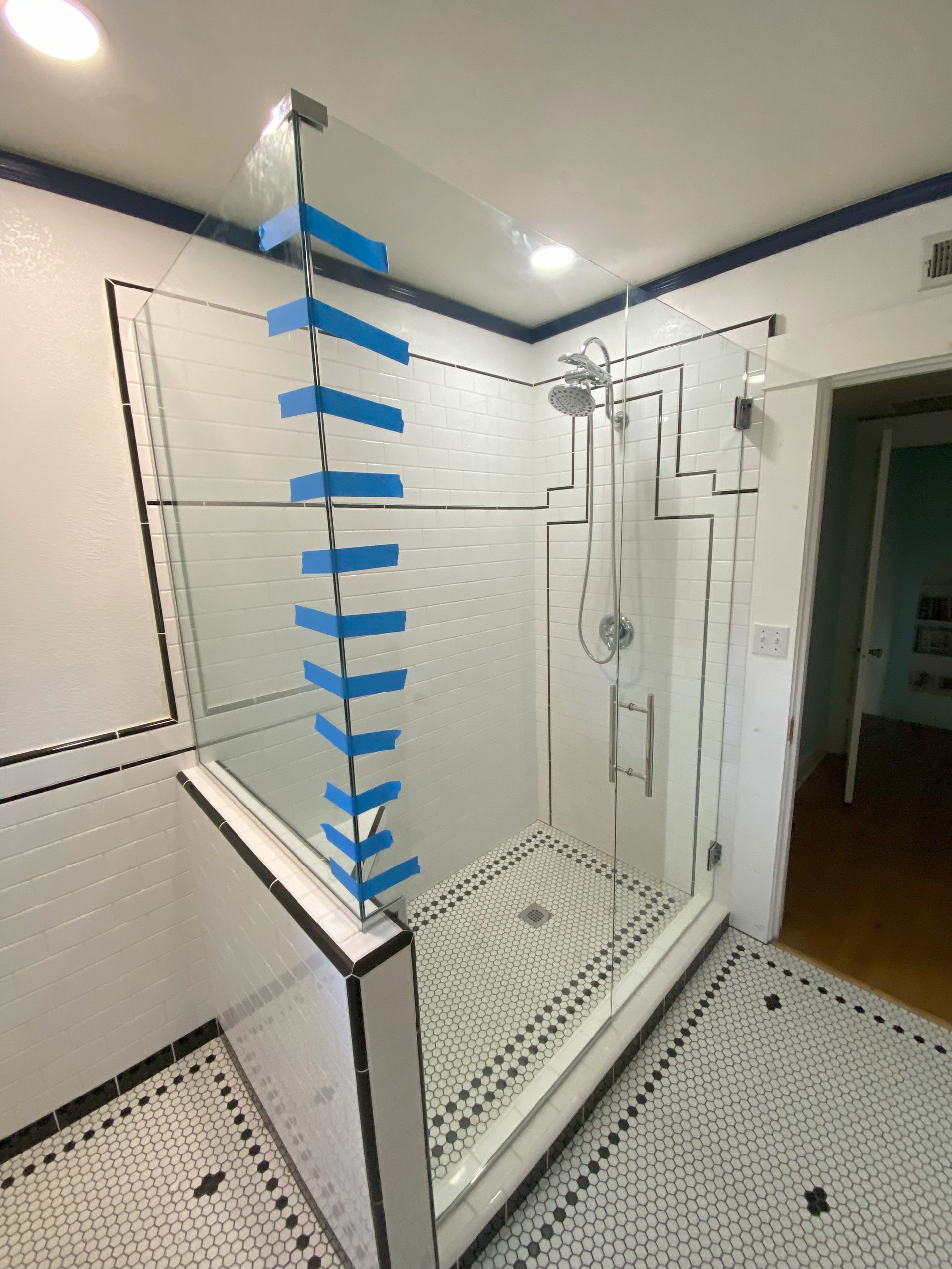 Custom-cut safety glass by Glassology finished with professional glazing and clean lines