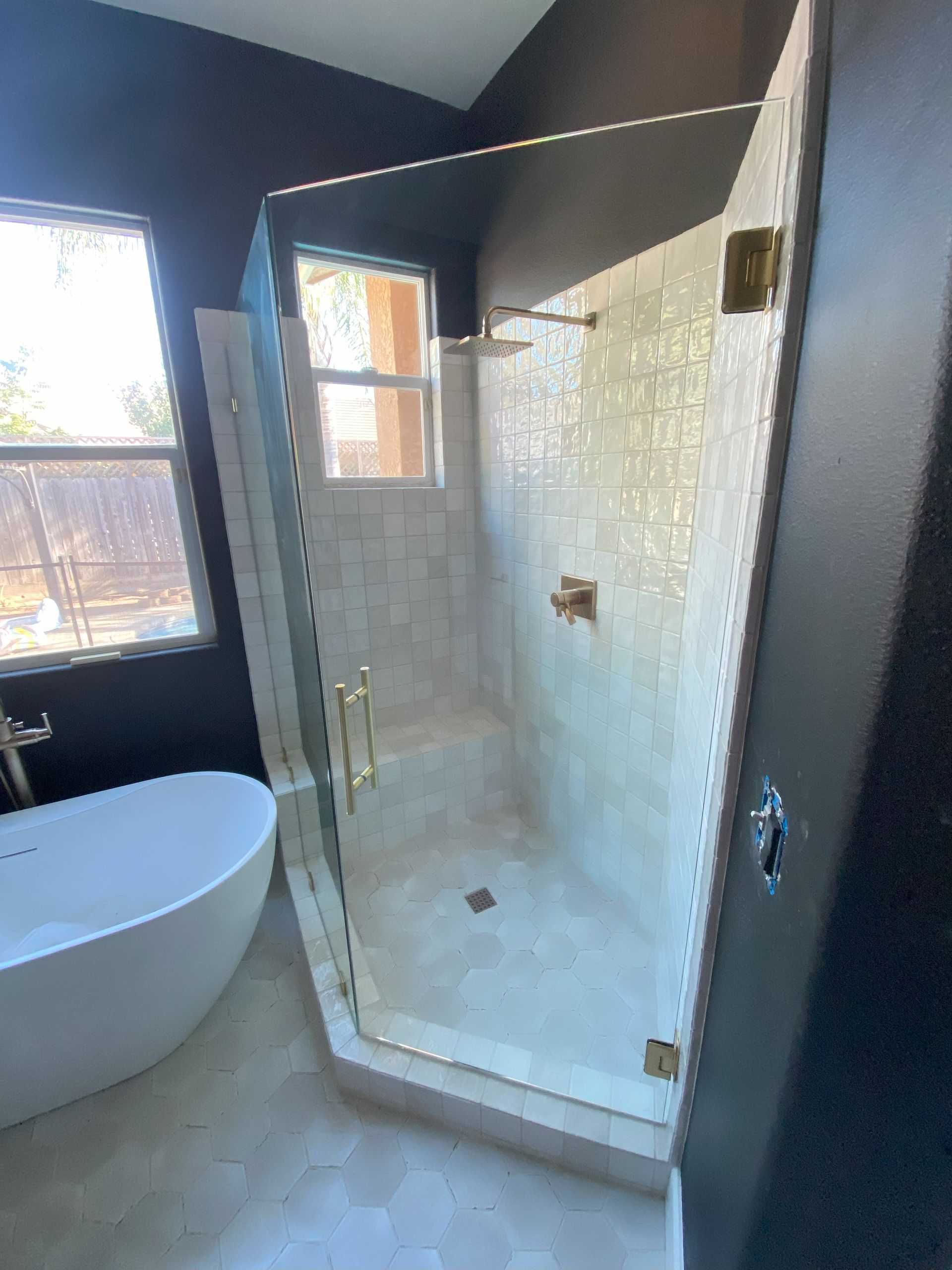 Crystal-clear low-iron glass enclosure by Glassology with precision-finished seams