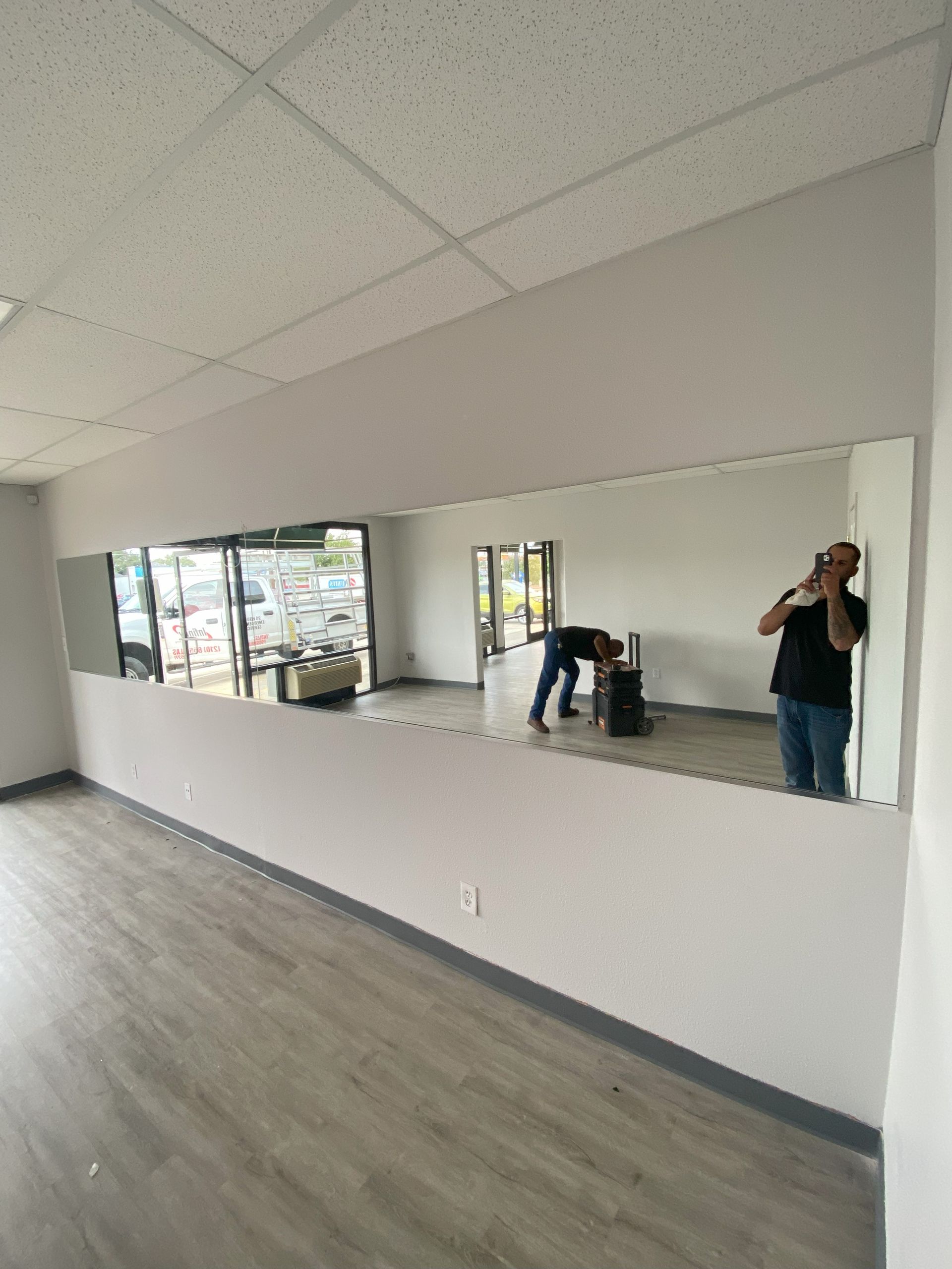 Large wall mirror professionally installed