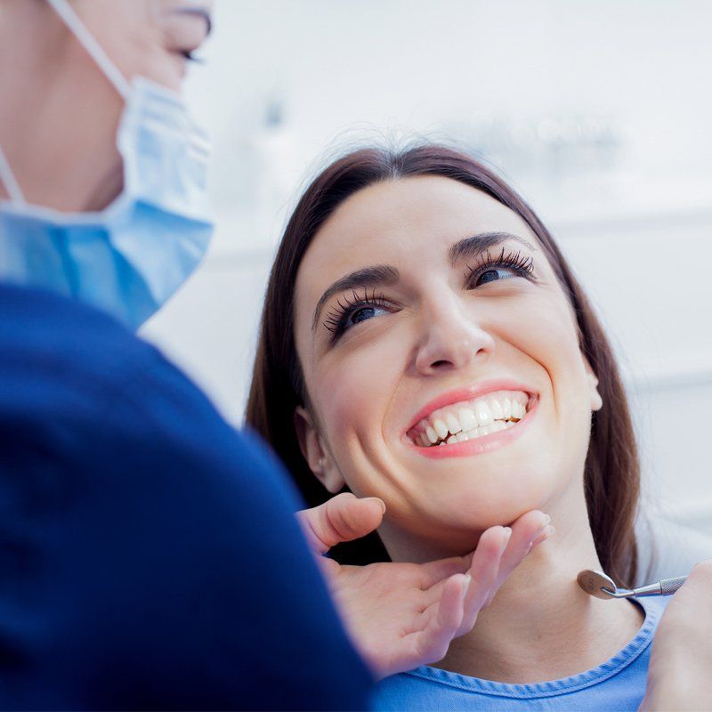Woman Visiting Her Dentist — Bunbury WA — FADC Dental Group Woman Visiting Her Dentist — Bunbury WA — FADC Dental Group