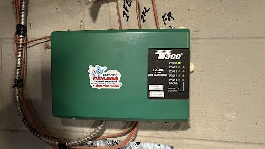 A green taco box is hanging on a wall.