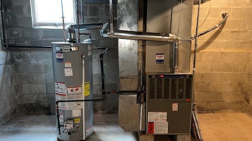 There is a water heater and an air conditioner in the basement.