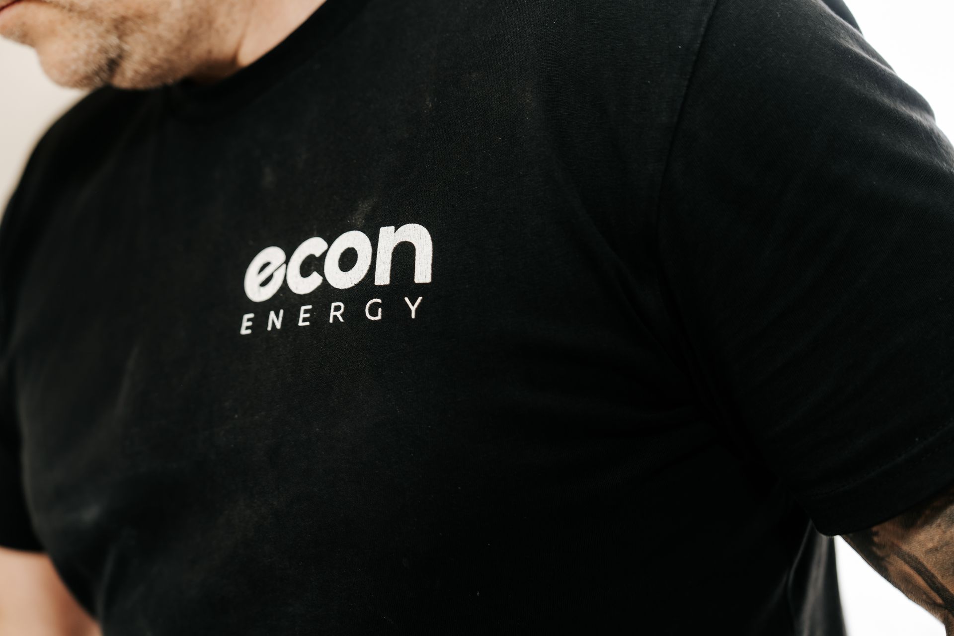 Econ Energy technician uniform logo close-up